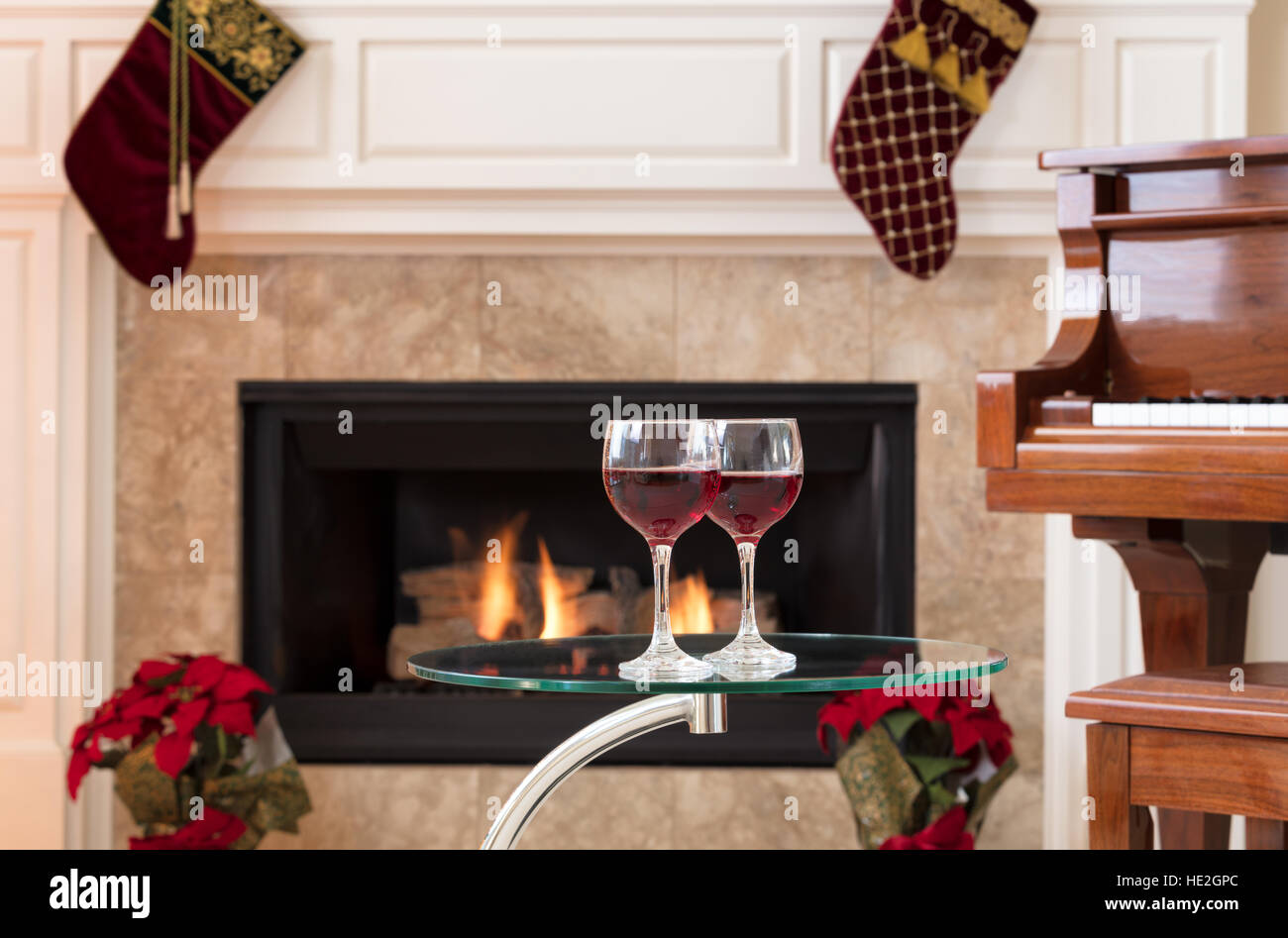 Two Glasses Of Red Wine On Top Of Glass Table With Glowing