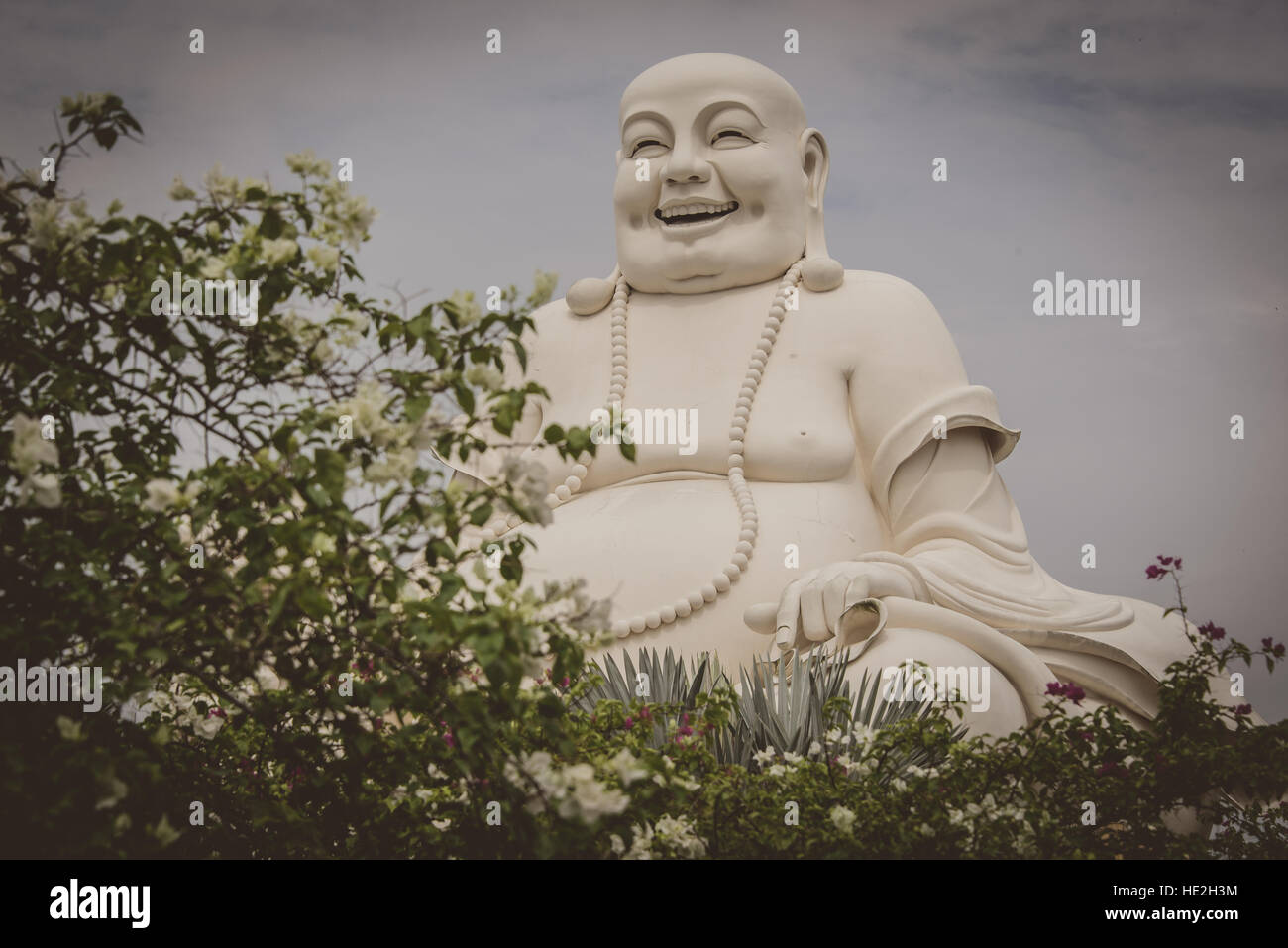 Fat happy Buddha statue in Vietnam Stock Photo