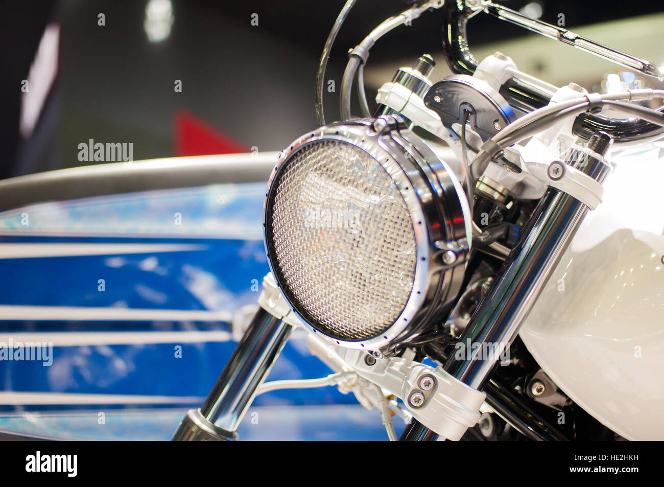 Headlights of motorcycles in a shop Stock Photo Alamy