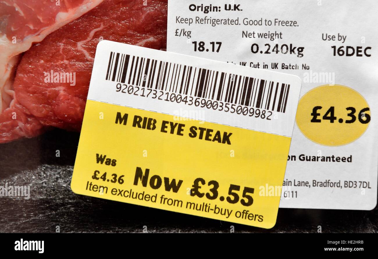 Rib eye steak with a price reduction sticker Stock Photo Alamy