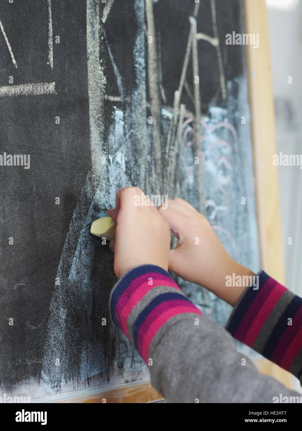 Child writing chalk Stock Photo Alamy