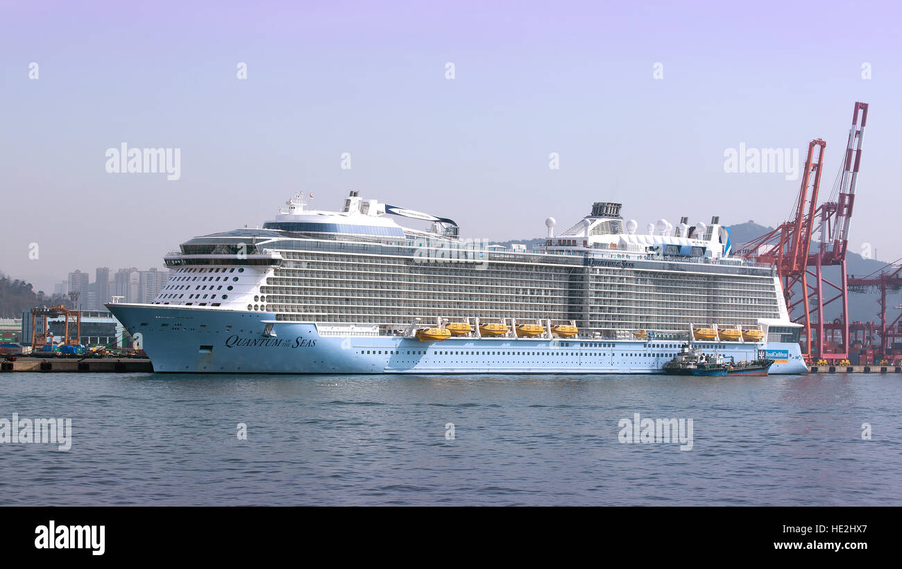 Busan, South Korea - March 22th, 2016: Busan, the Quantum of the Seas passenger ship is moored to of the container terminal. Stock Photo