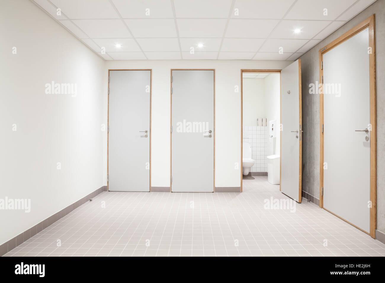 In an public building are womans toilets whit black doors Stock Photo ...