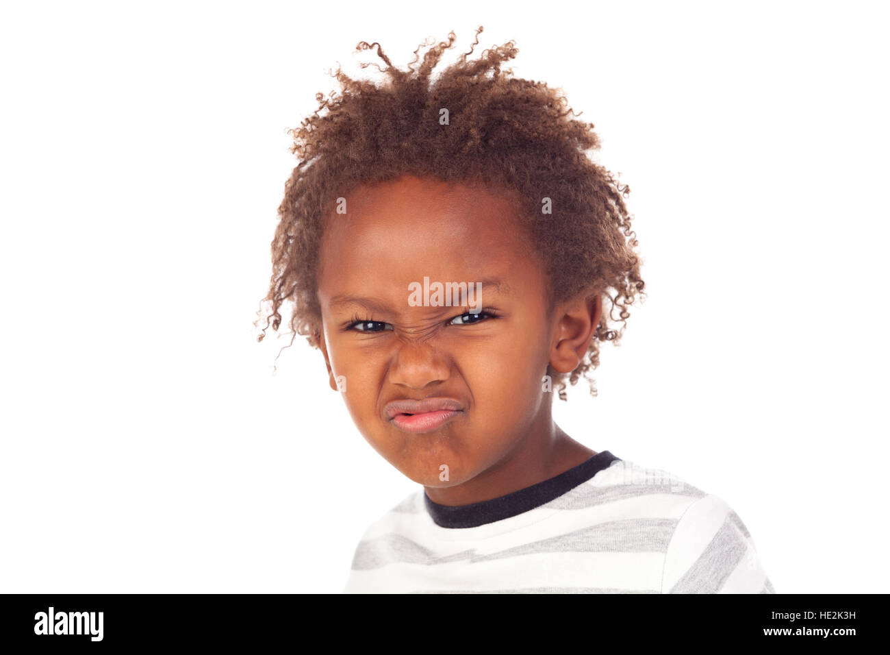 African child putting mean face isolated on white background Stock Photo Alamy