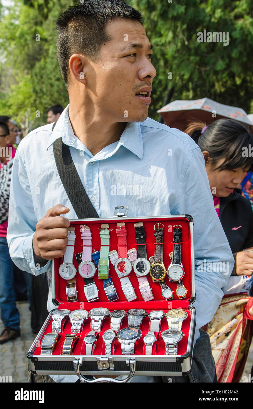 Vendor selling fake Rolex watches at Temple of Heaven (Altar of Heaven)  Beijing, China Stock Photo - Alamy