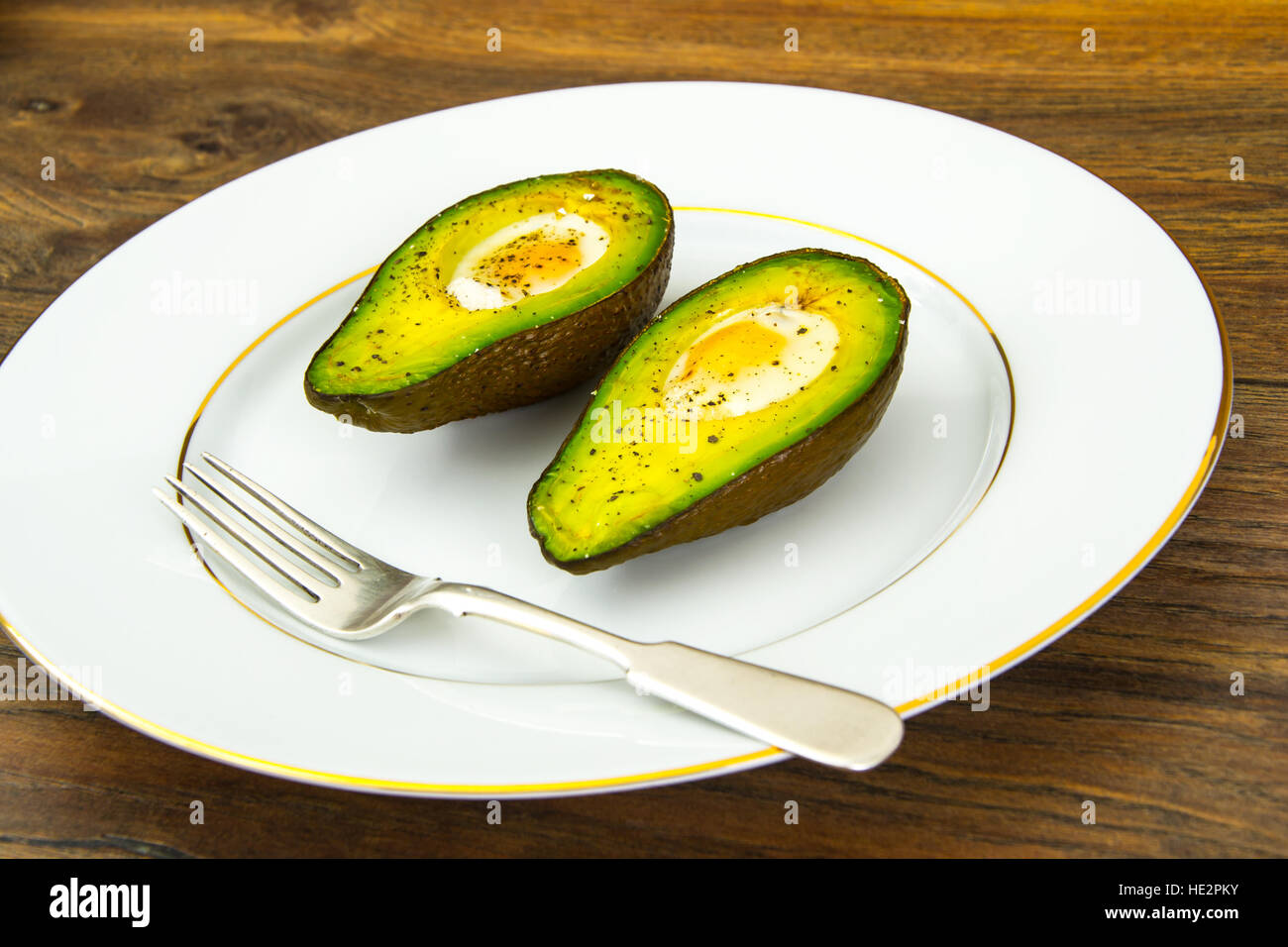 Avocados, Baked with Quail Egg, Salt, Pepper, Lemon Stock Photo Alamy