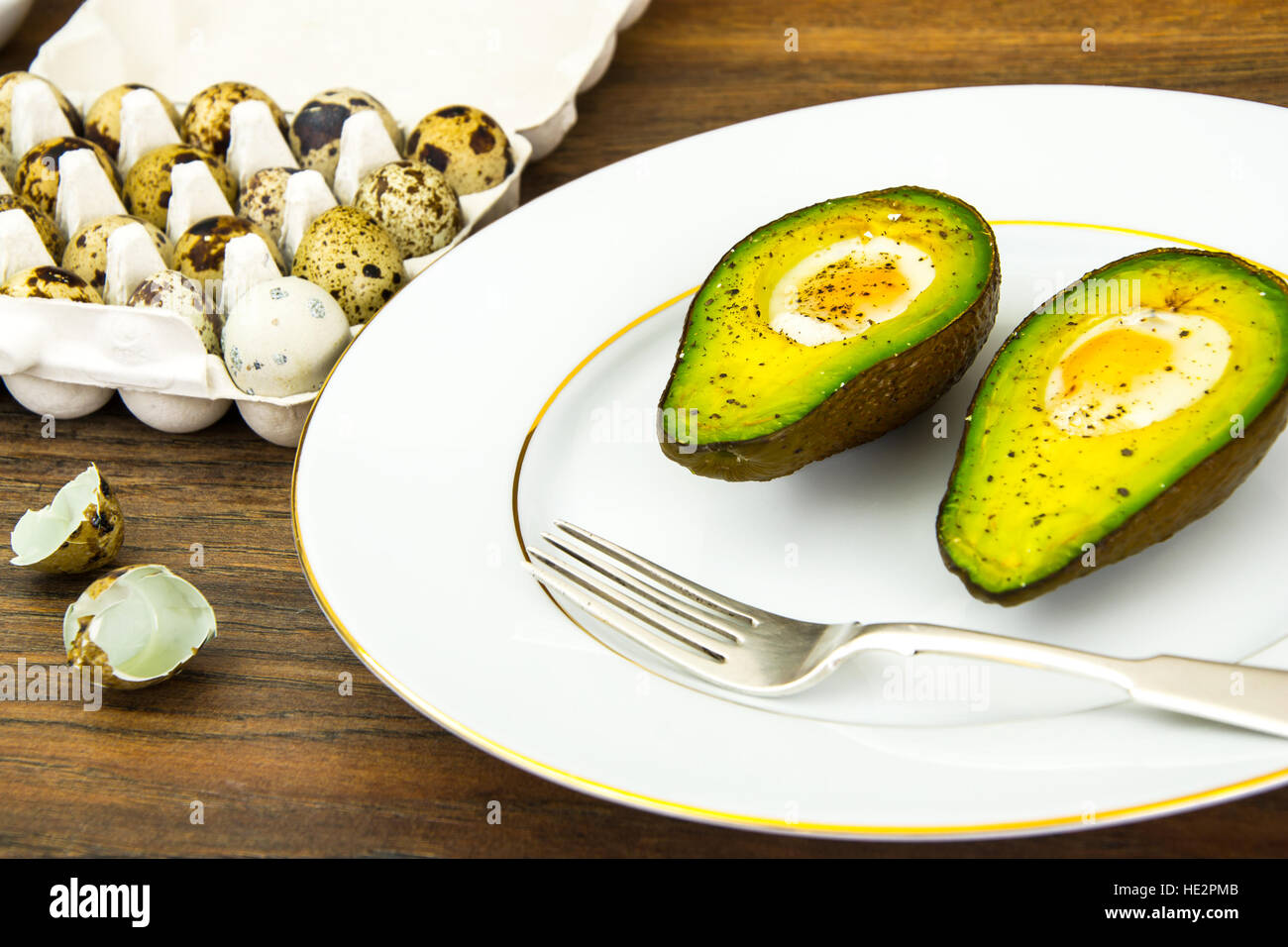 Avocados, Baked with Quail Egg, Salt, Pepper, Lemon Stock Photo Alamy