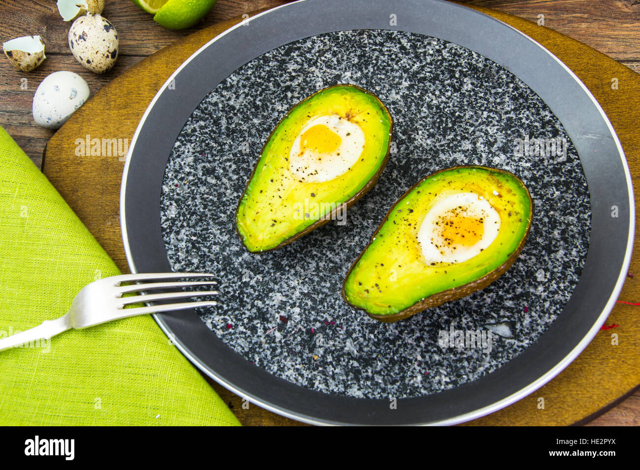 Avocados, Baked with Quail Egg, Salt, Pepper, Lemon Stock Photo Alamy
