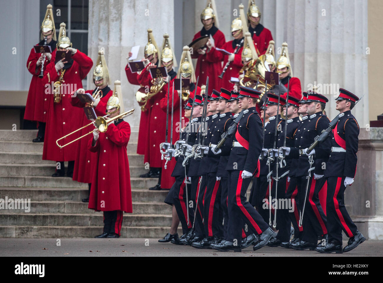 Officer Cadets march at the Royal Military Academy, Sandhurst, Berkshire, where the Duchess of Cornwall is representing Queen Elizabeth II at the Sovereign's Parade, which is held at the end of each term at Sandhurst and marks the passing out of Officer Cadets who have completed their Commissioning Course. Stock Photo