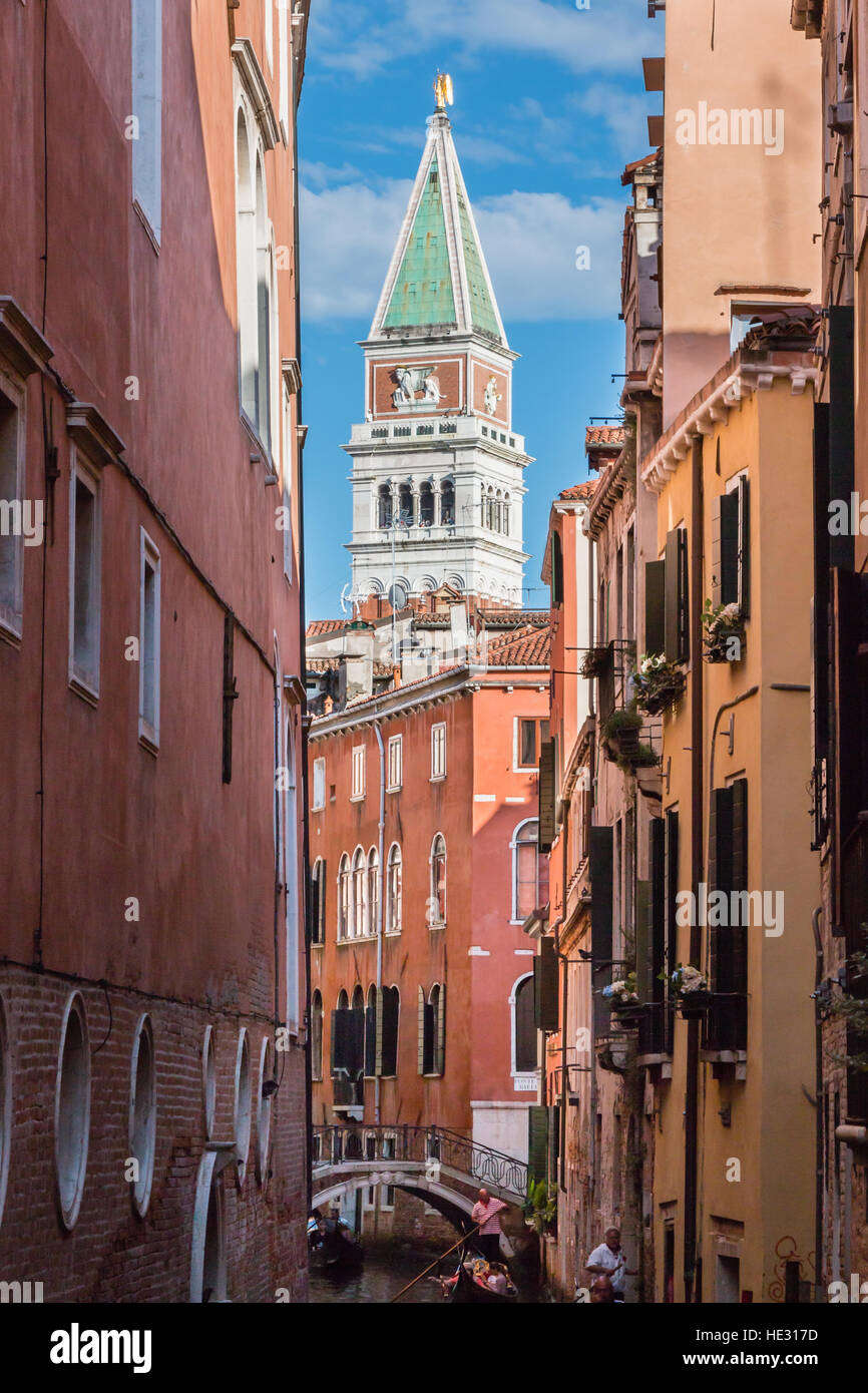Typical Narrow Street in Venice and St. Marks Bell Tower Campanile in Background Venice, Italy