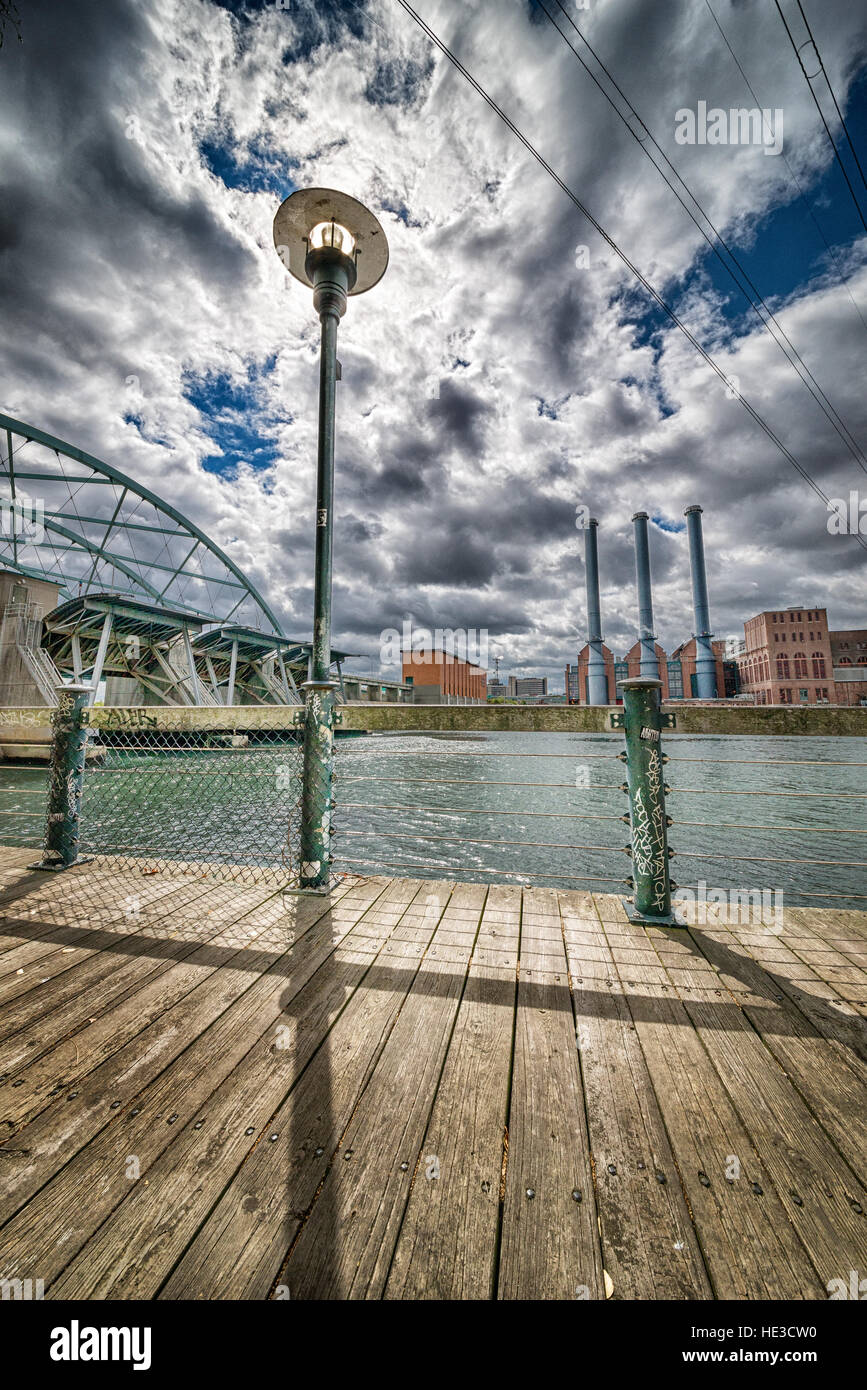 This vie shows the flood control barrier, the new I-way bridge as well a a view over the boardwalk to the power company Stock Photo