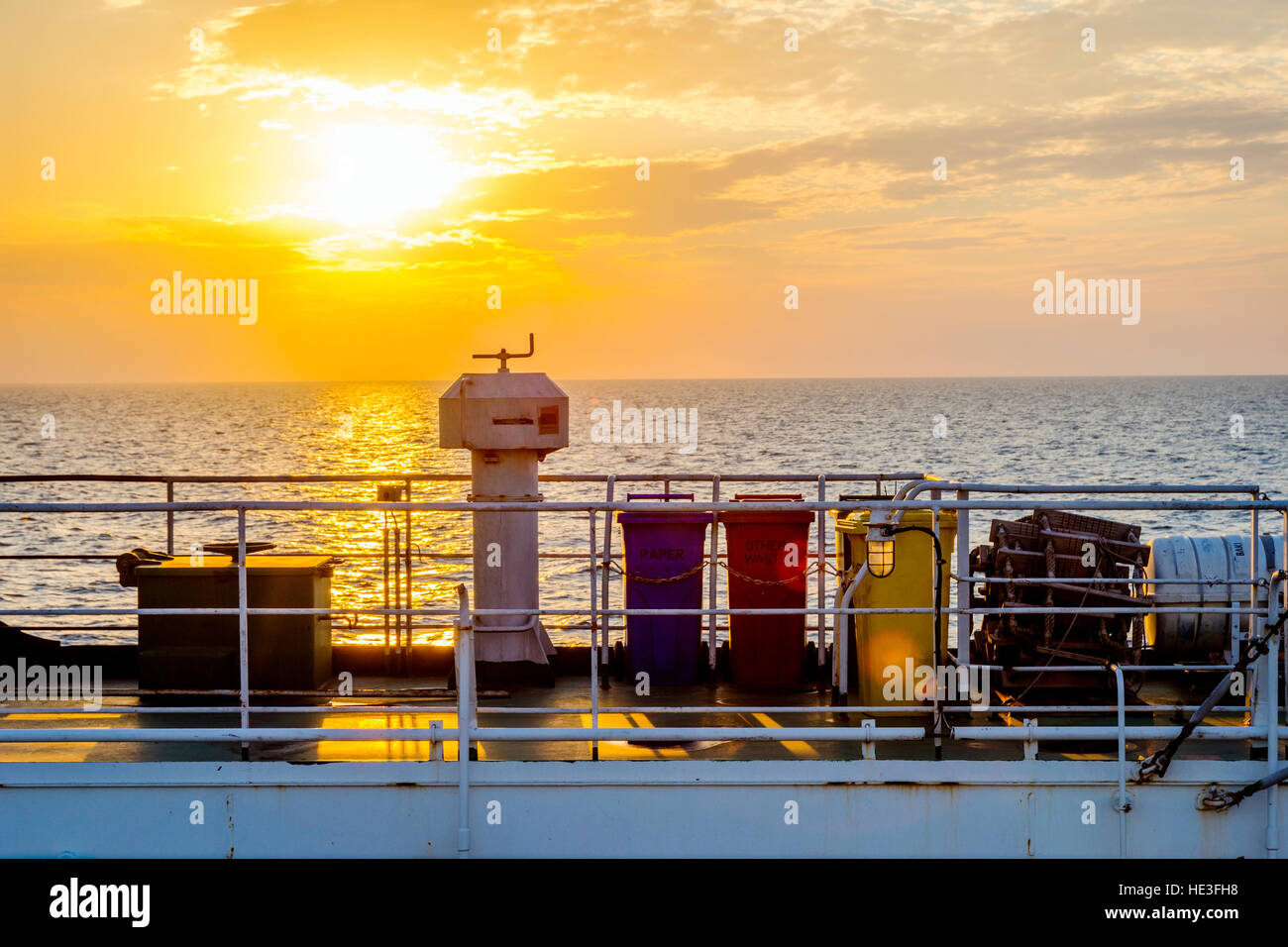Trash container on the cargo vessel ship at the sea Stock Photo