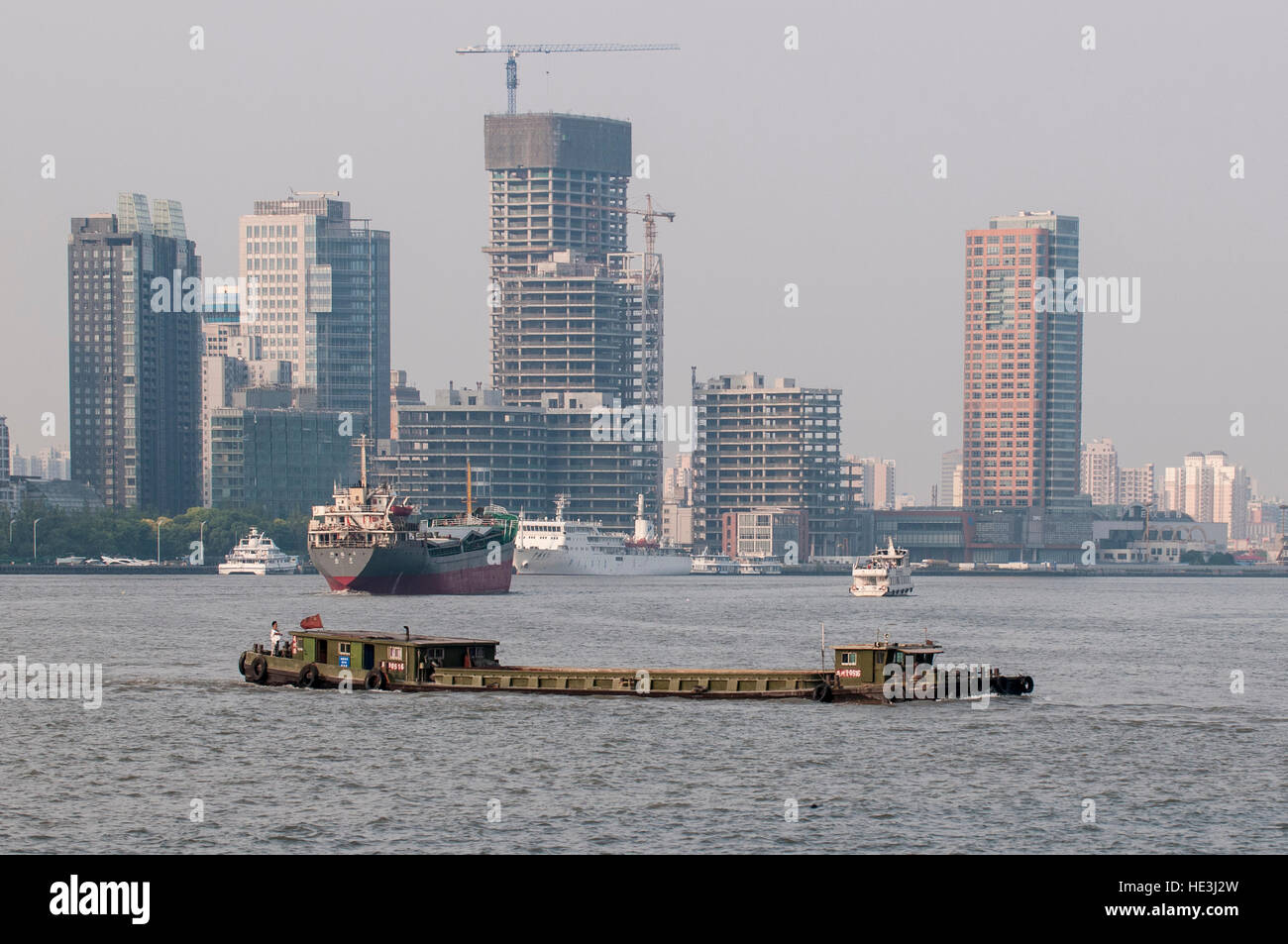 Barges and pudong skyline hi-res stock photography and images - Alamy