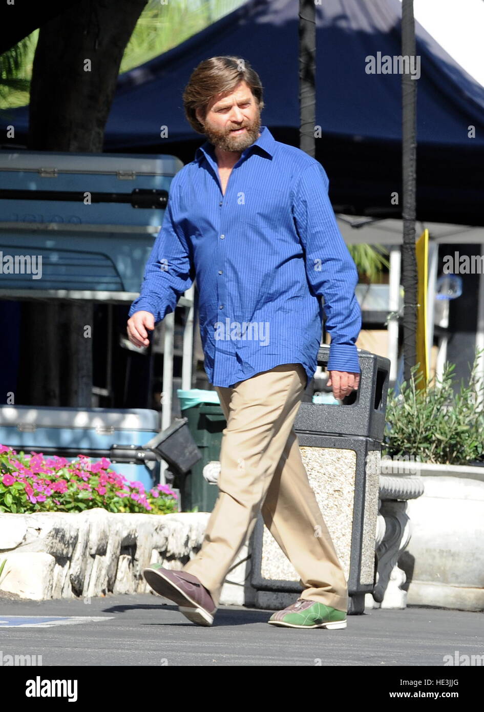 Zach Galifianakis on set filming 'Baskets' with bowling shoes on