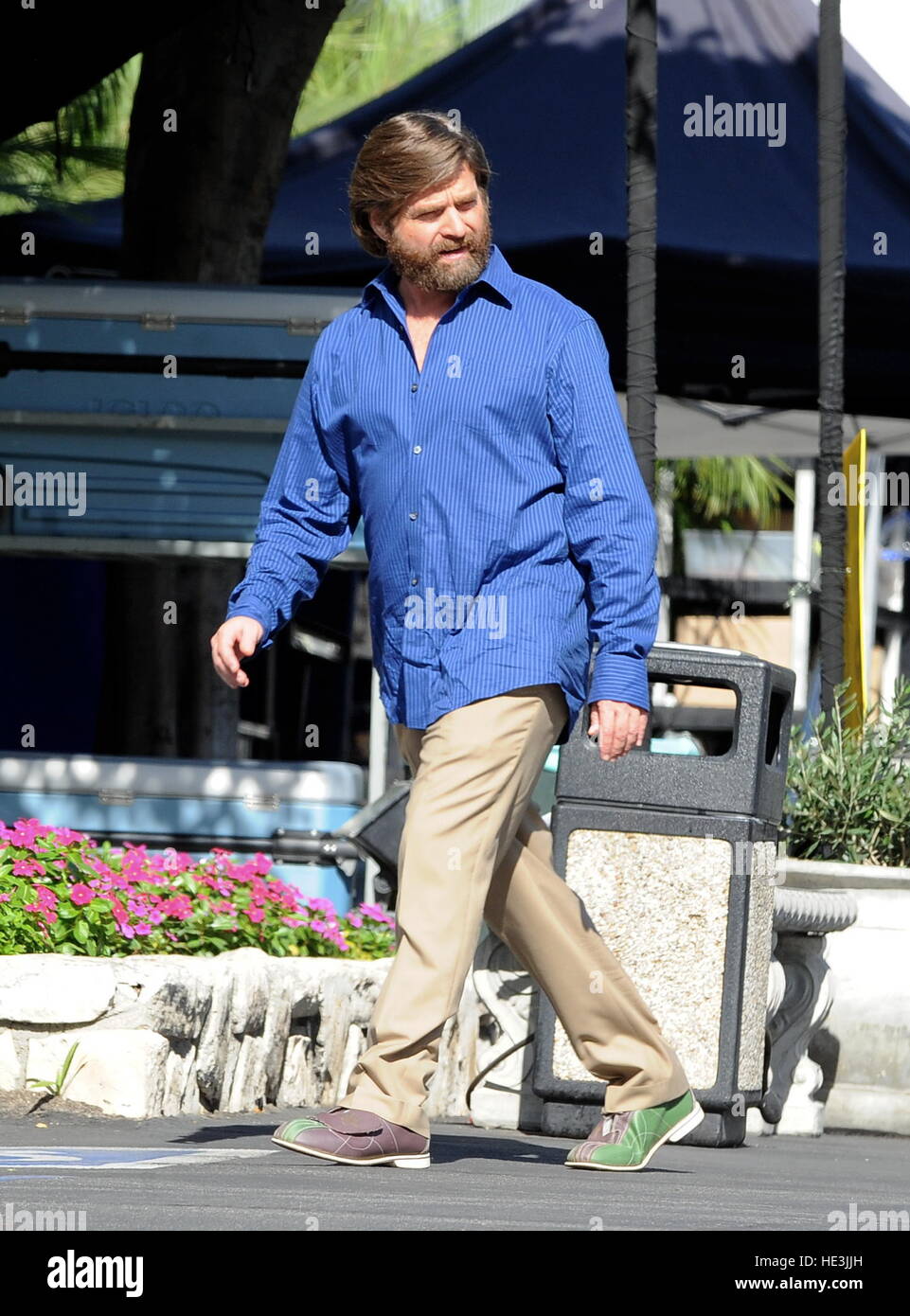 Zach Galifianakis on set filming 'Baskets' with bowling shoes on