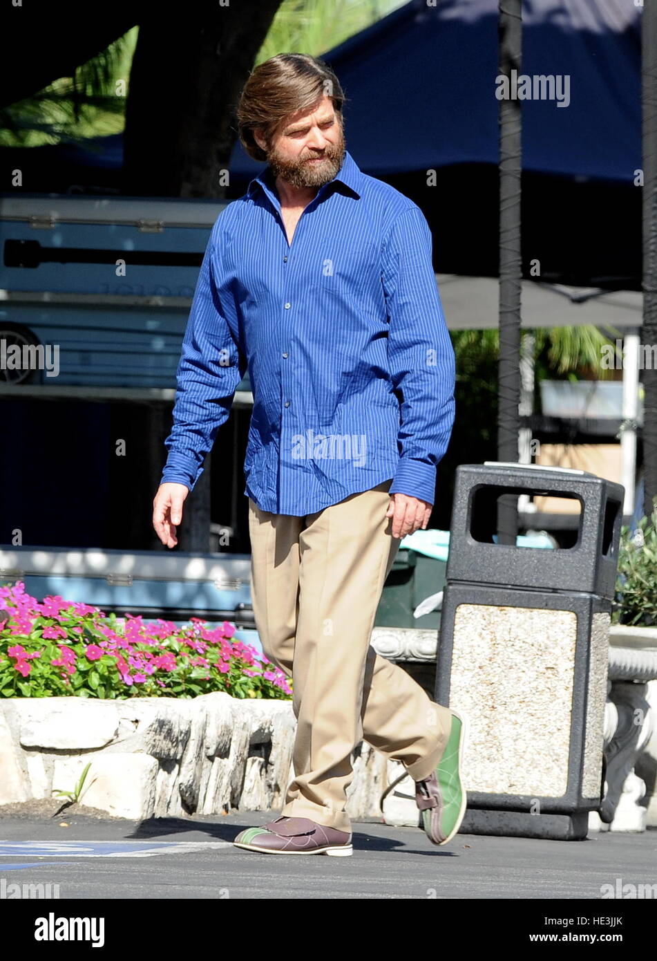 Zach Galifianakis on set filming 'Baskets' with bowling shoes on
