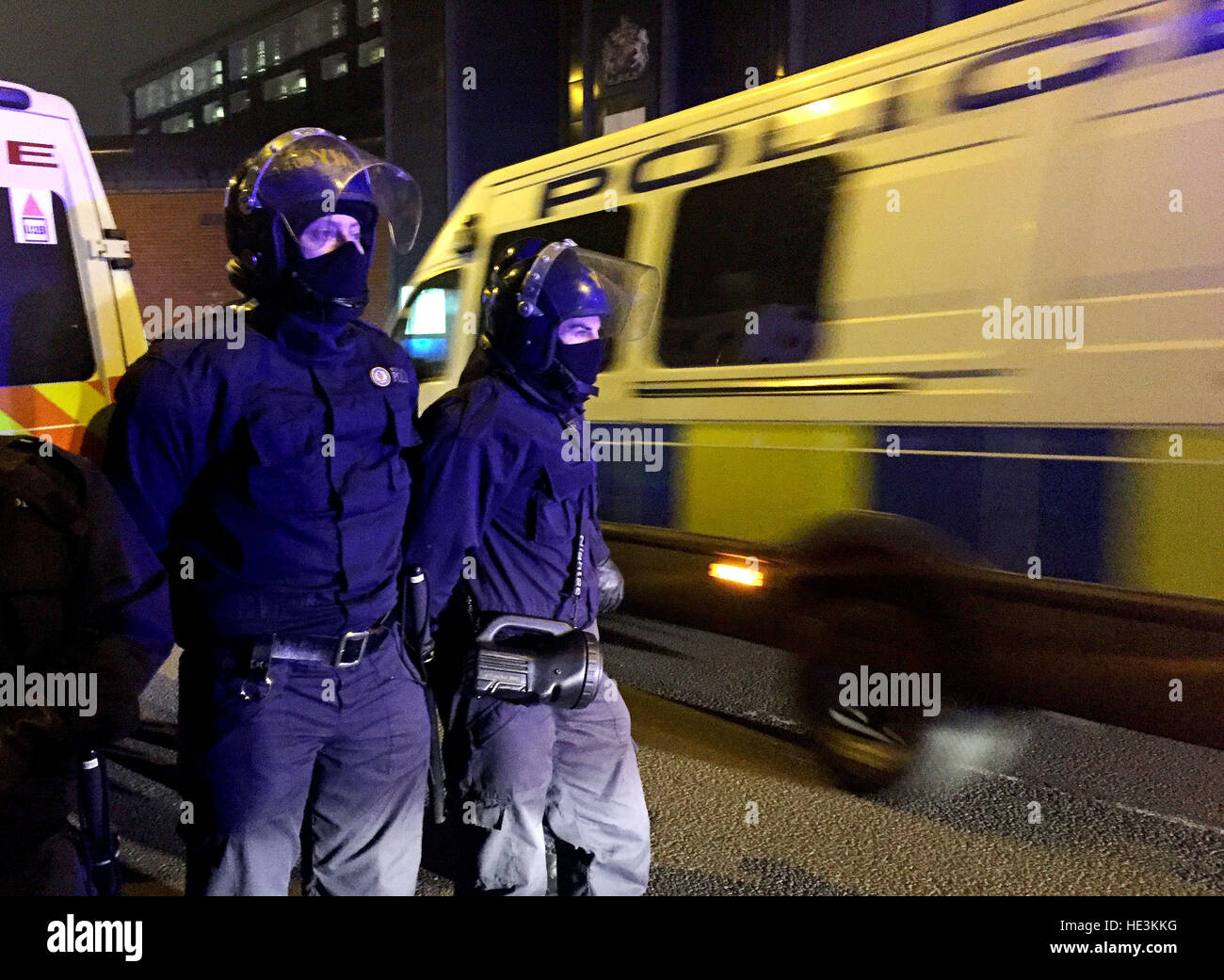 Police officers outside HMP Birmingham where a disturbance is under way. A specialist riot squad known as the 'Tornado Team' has been deployed to quell the trouble which started at the prison - formerly known as Winson Green - in the city centre at around 9am. Stock Photo