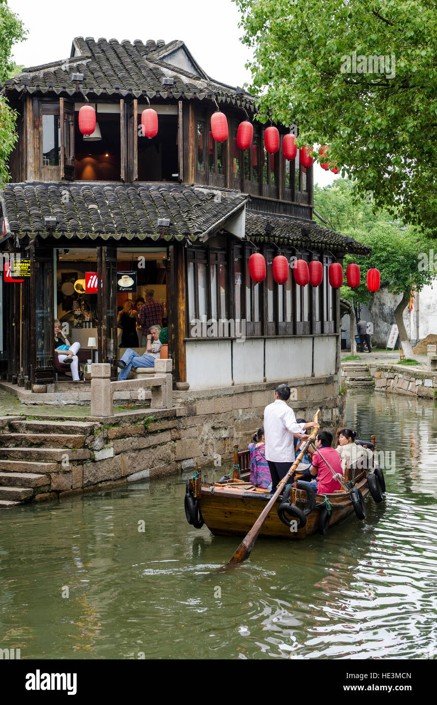 Tourists in chinese gondola canal boat the water village of Tongli