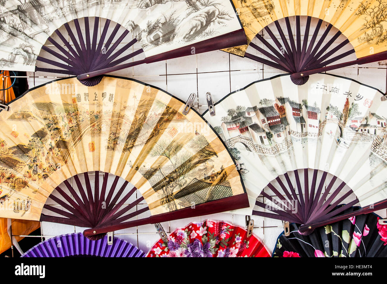 Paper silk fans souvenirs in market shop water canal village of Tongli, China. Stock Photo