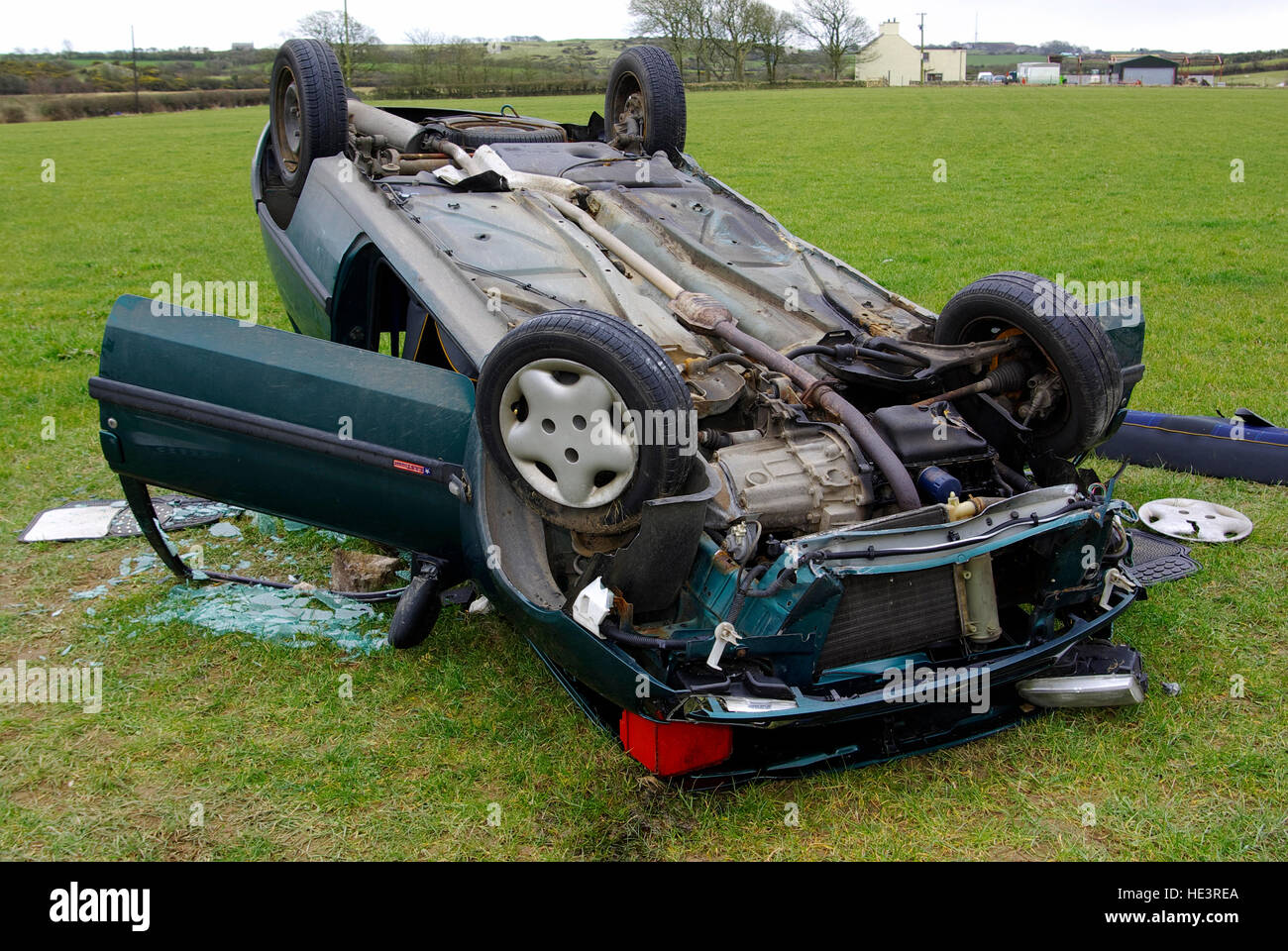 Crashed Car in field, Anglesey, North Wales, United Kingdom, Stock Photo