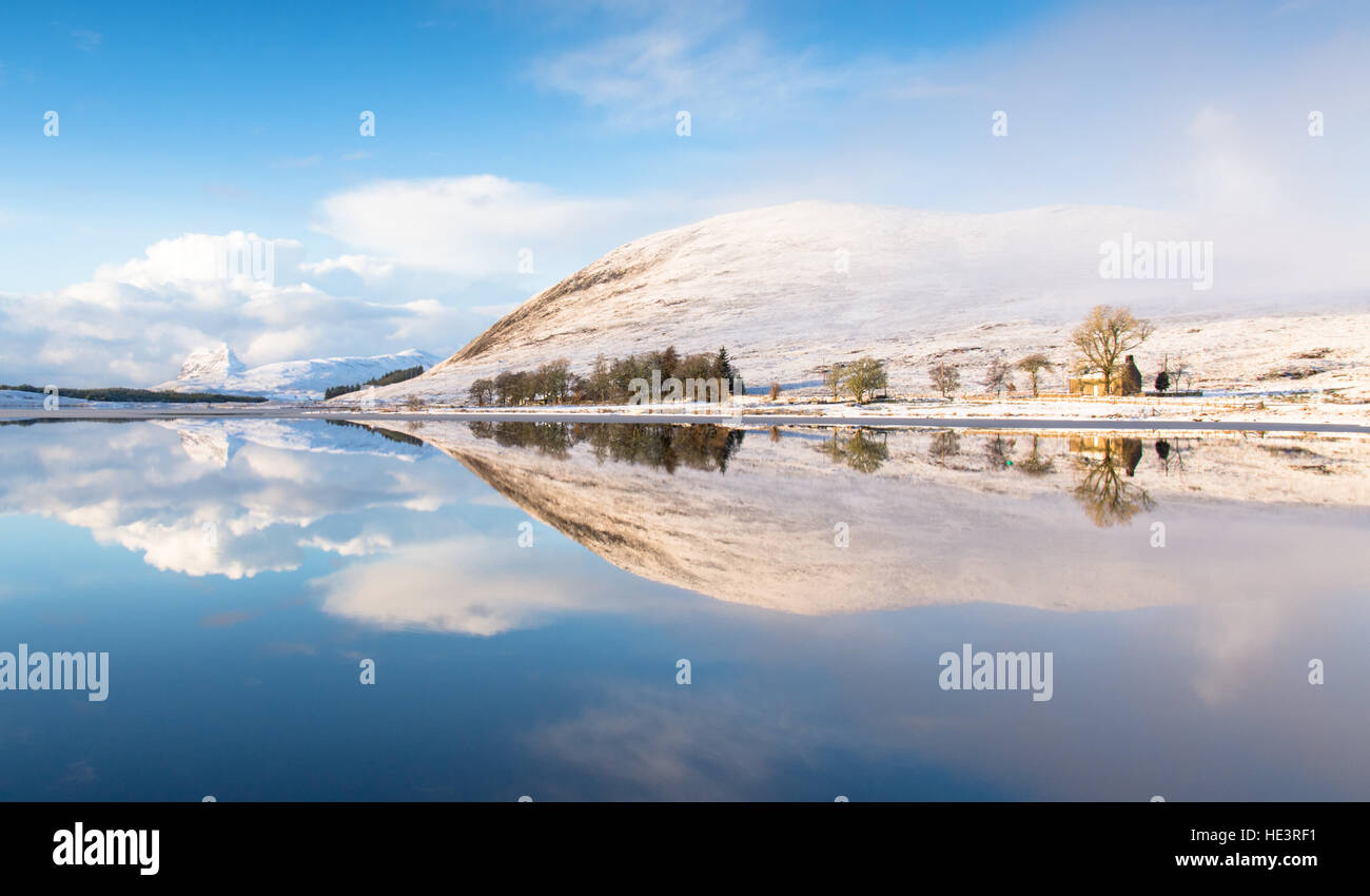 Suilven mountain reflected in Loch Borrolin, Highlands, Scotland, UK Stock Photo