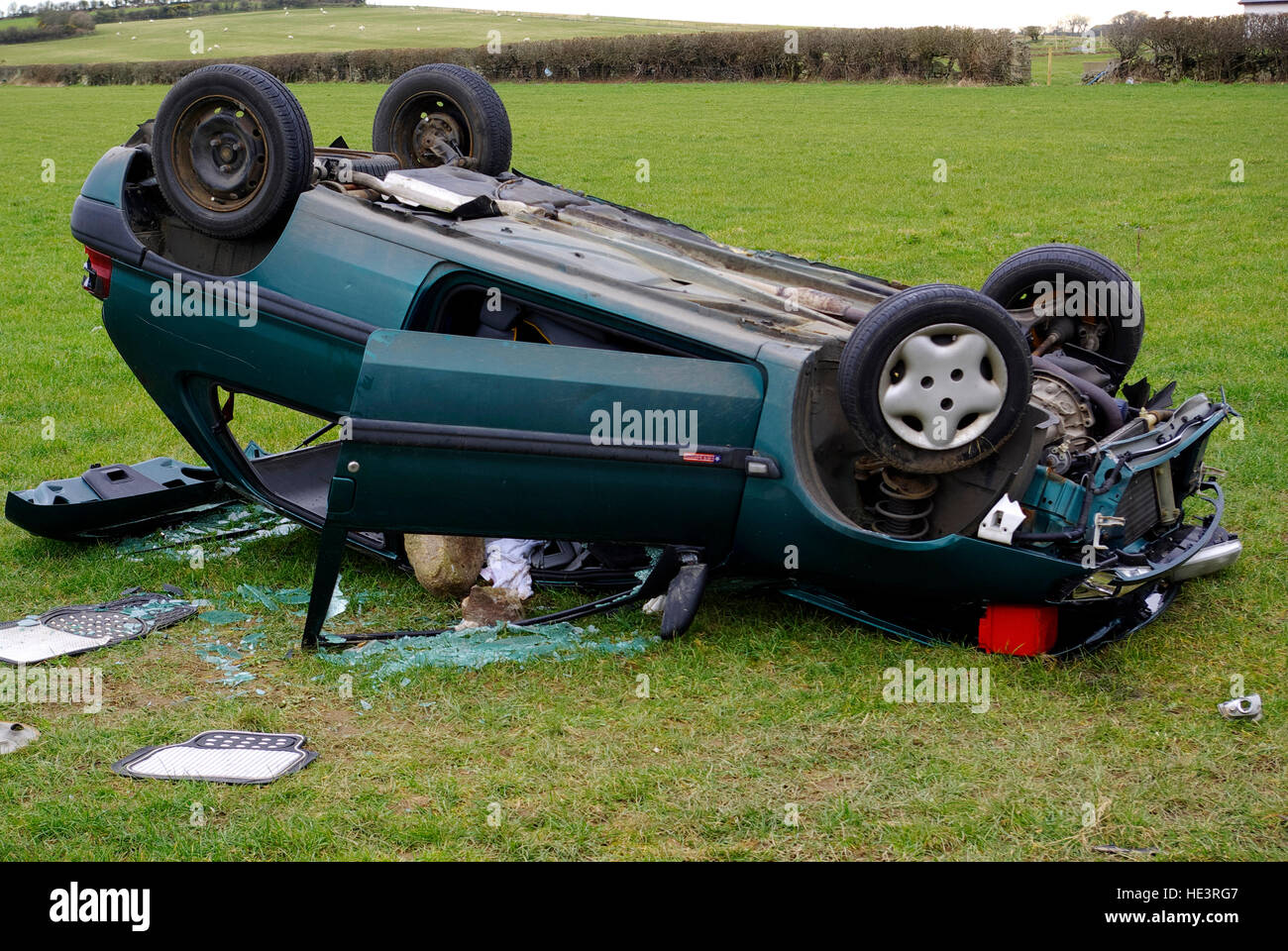 Crashed Car in field, Anglesey, North Wales, United Kingdom, Stock Photo