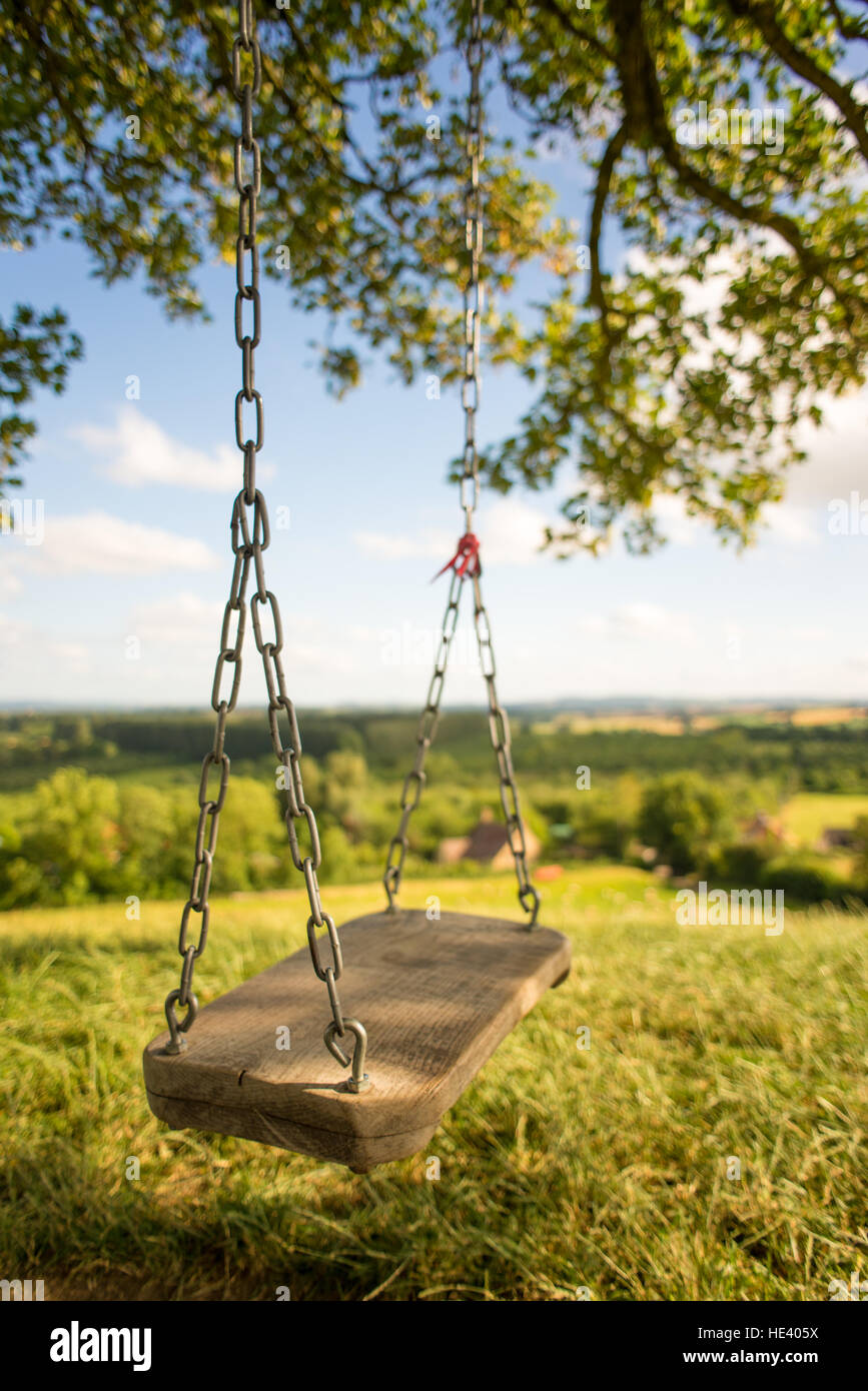 Old swing by burrow hill cider farm, somerset, england Stock Photo Alamy