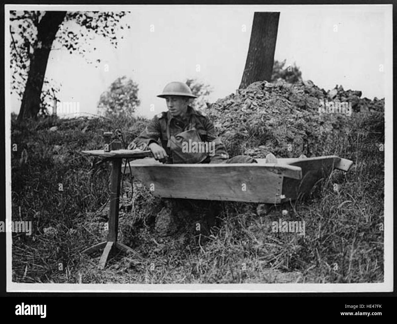 Signaller with his instruments makes himself a comfortable seat in ...