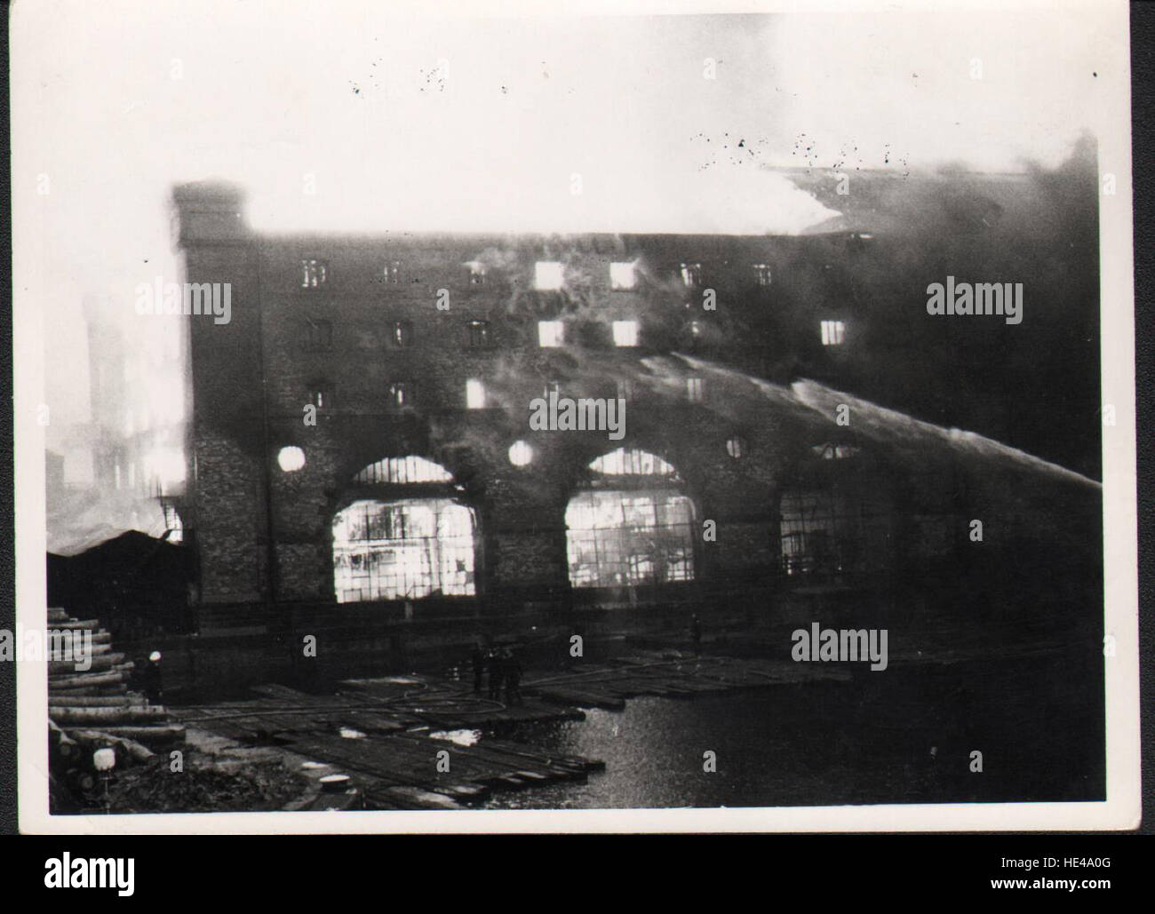 Firemen tackling the fire Match factory fire 1954 Stock Photo Alamy