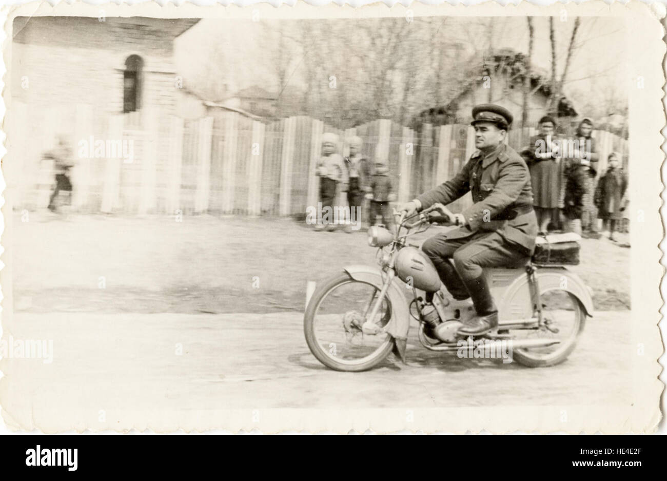 Ion Lupășneanu în uniformă de miliție, pe motocicletă  din colecția personală Pîslaru Bogdan Cosmin Stock Photo