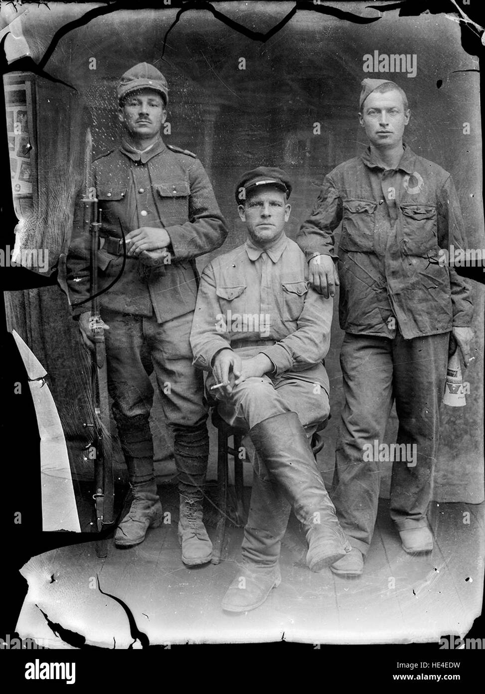 Two soviet POW's “guarded” by a Romanian soldier armed with the old Mannlicher model 1893 rifle.  The project Costică Acsinte Archive needs help: please donate and share the link igg.me/at/acsinte/x/6146081 ( http://igg.me/at/acsinte/x/6146081 ) Stock Photo