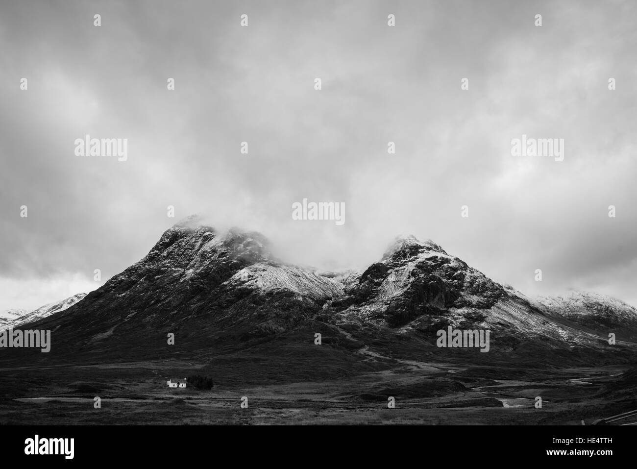 Lone house below buchaille etive mor in the Scottish Highlands, Glencoe Scotland. Stock Photo