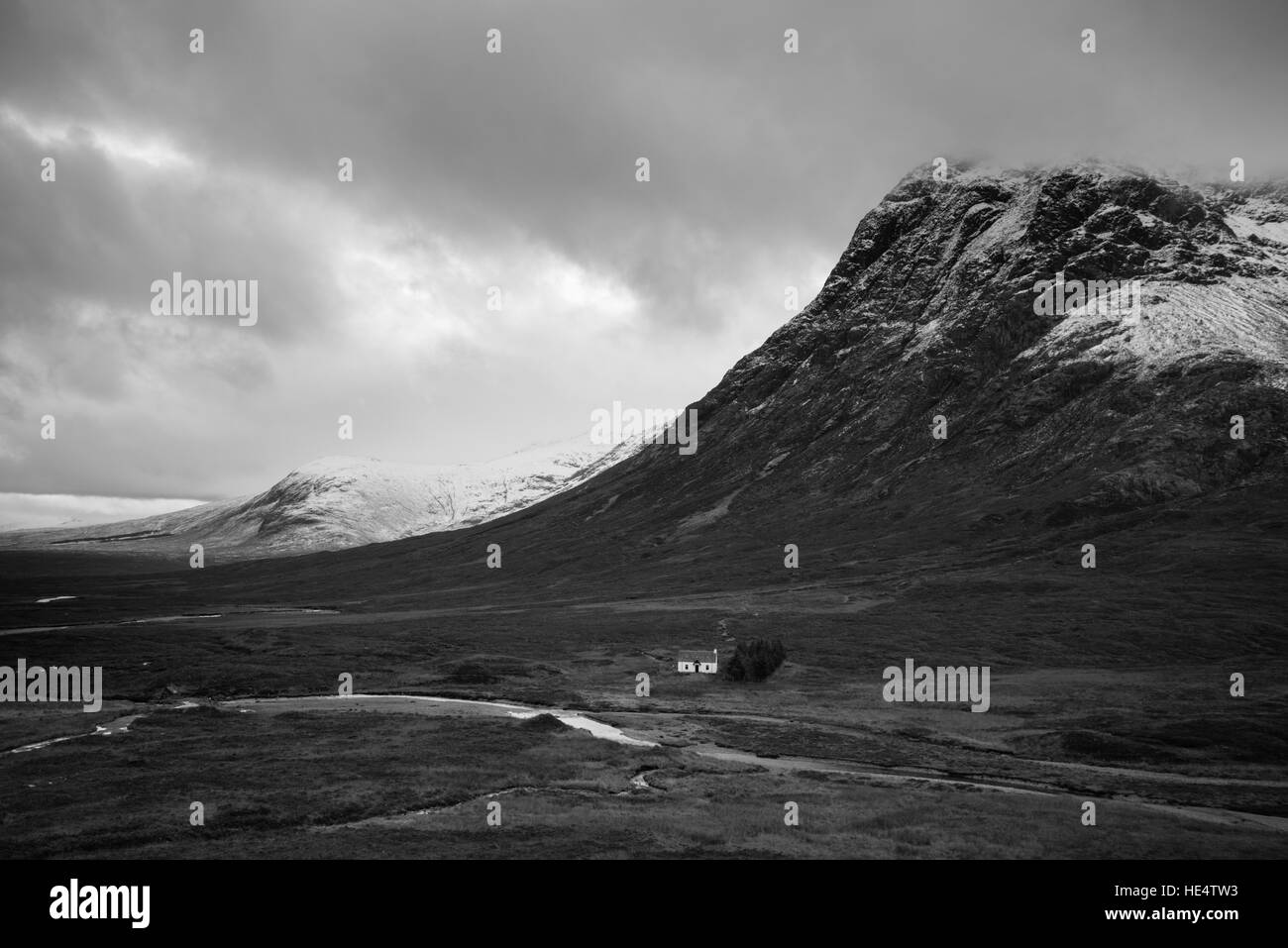 Lone house below buchaille etive mor in the Scottish Highlands, Glencoe Scotland. Stock Photo