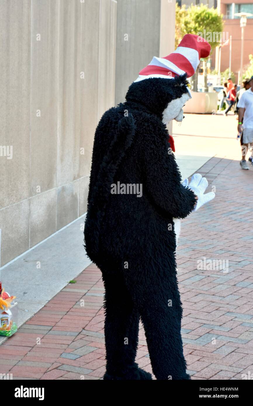The Cat In The Hat walking around and giving out his book in downtown Baltimore Stock Photo