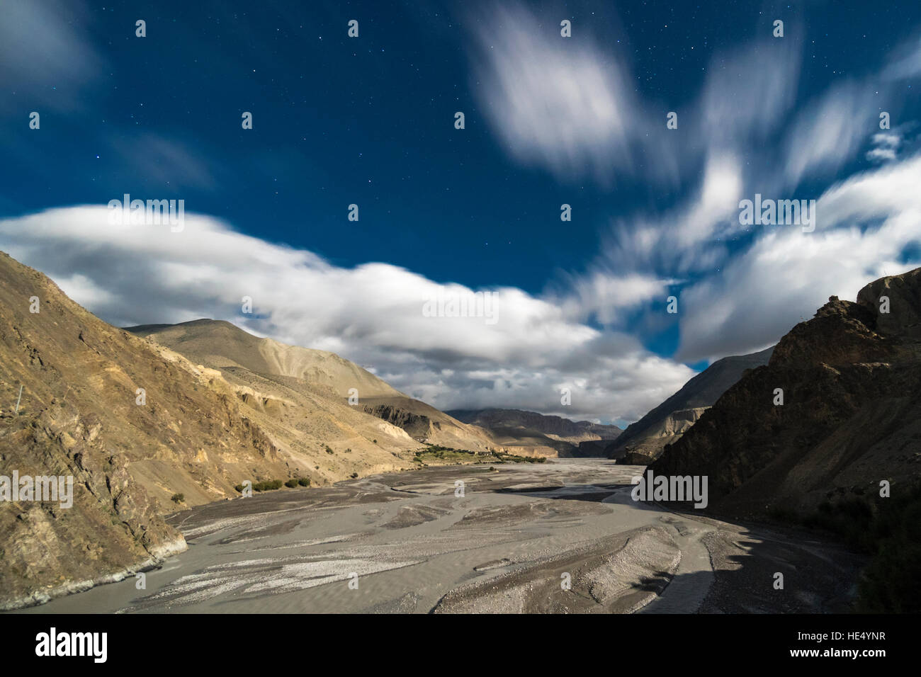 View on the Kali Gandaki valley towards Upper Mustang at night with stars Stock Photo
