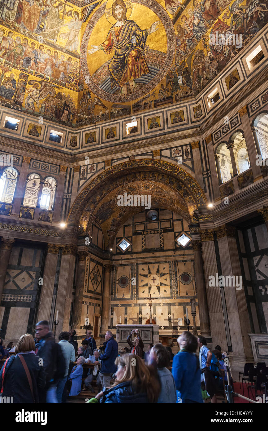 FLORENCE, ITALY - NOVEMBER 4, 2016: tourists in Florence Baptistery San Giovanni on Piazza San Giovanni . The Baptistery is one of the oldest building Stock Photo