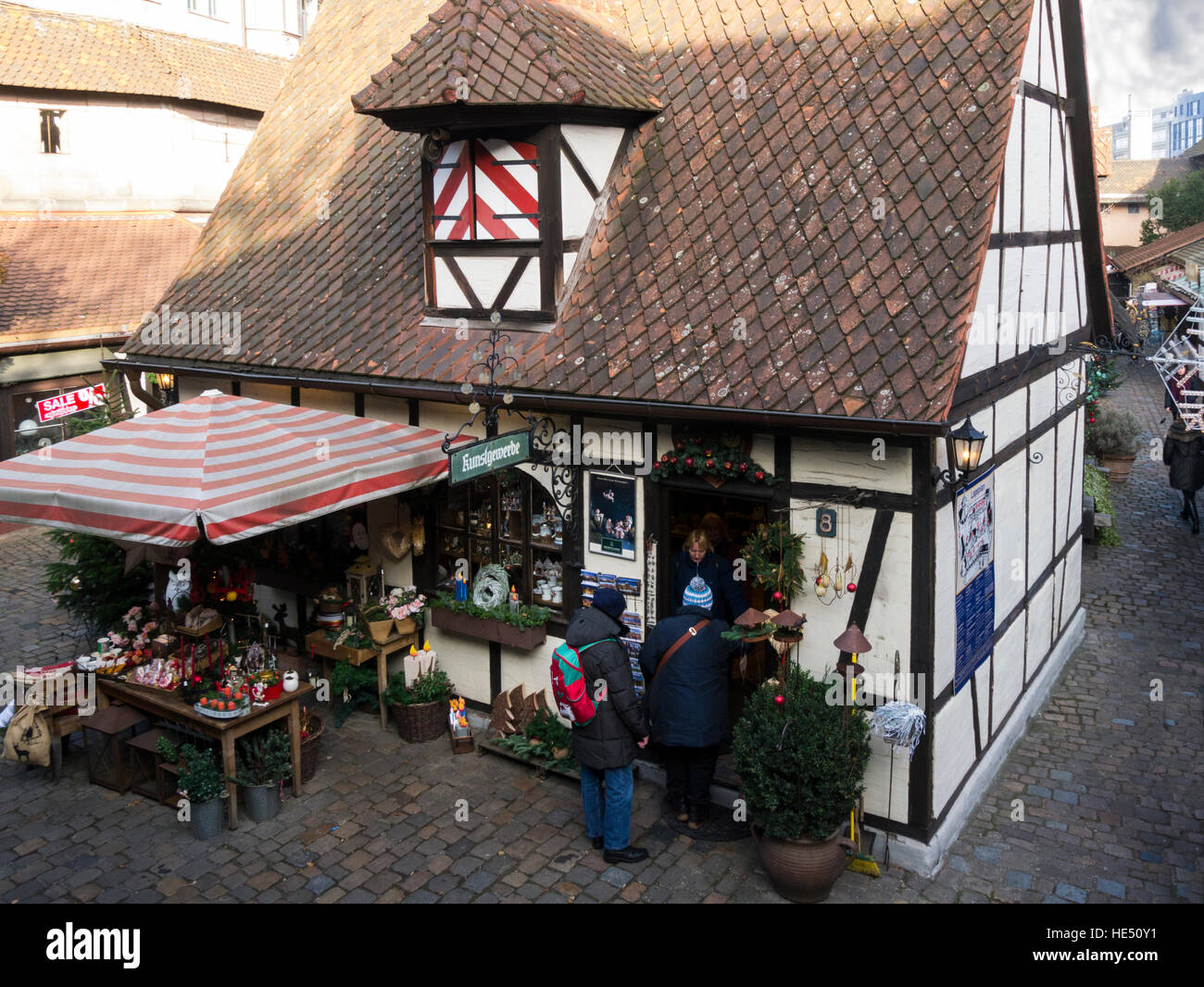Looking down on shop in Craftsmens' Courtyard Handwerkerhof Nuremberg Bavaria Germany EU area of small traditional craft shops for gifts and souvenirs Stock Photo