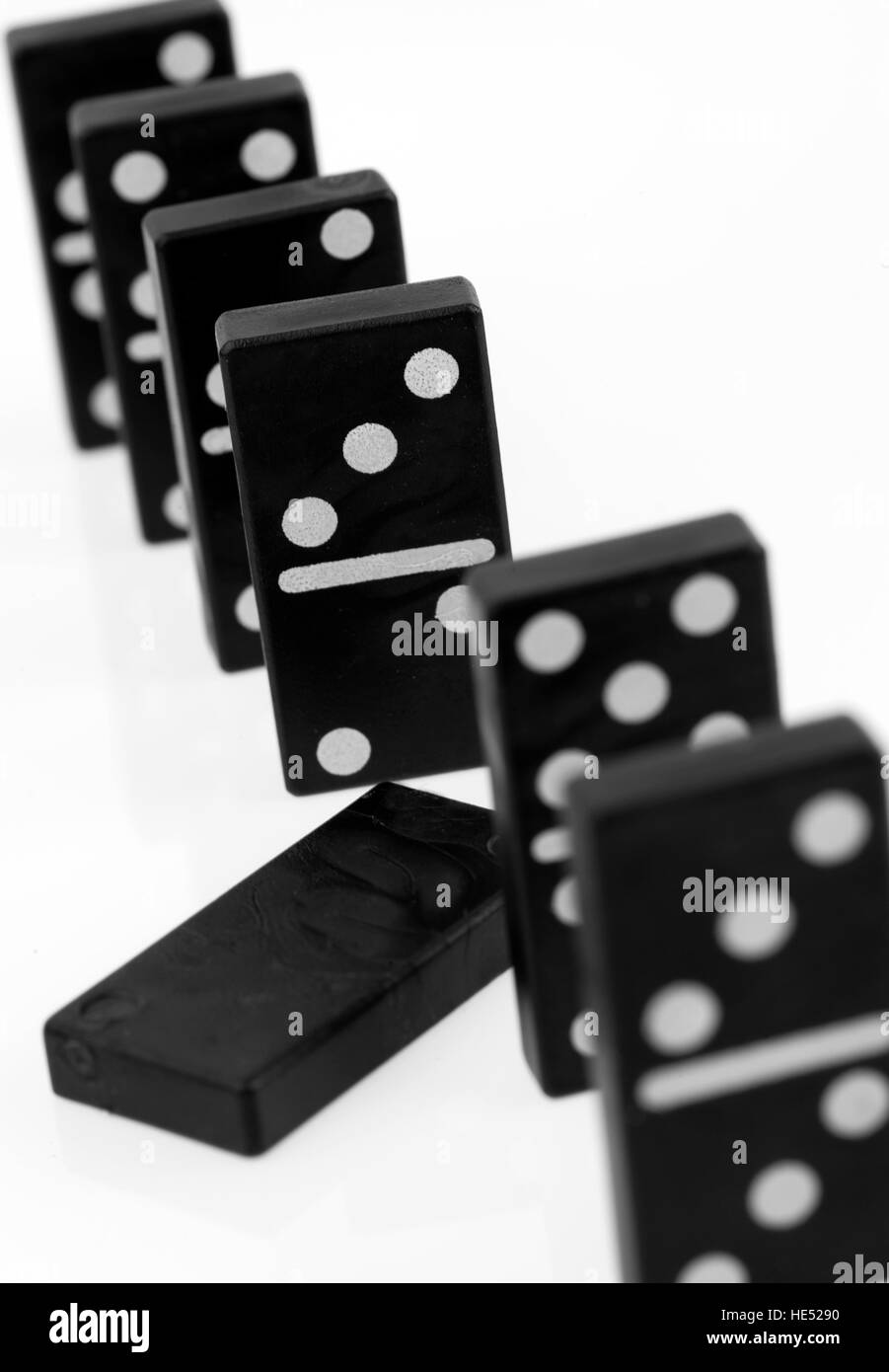 Dominos falling over Black and White Stock Photos & Images Alamy
