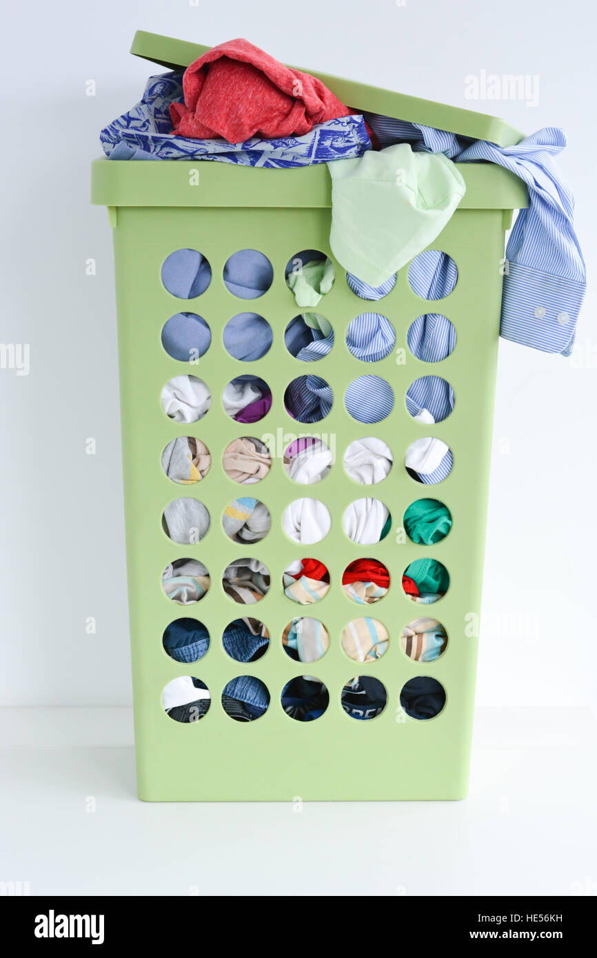 full-laundry-basket-with-dirty-clothes-stock-photo-alamy