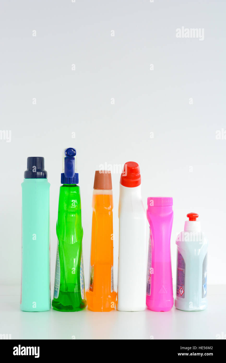 Many bottles of cleaning solutions isolated on white background Stock Photo