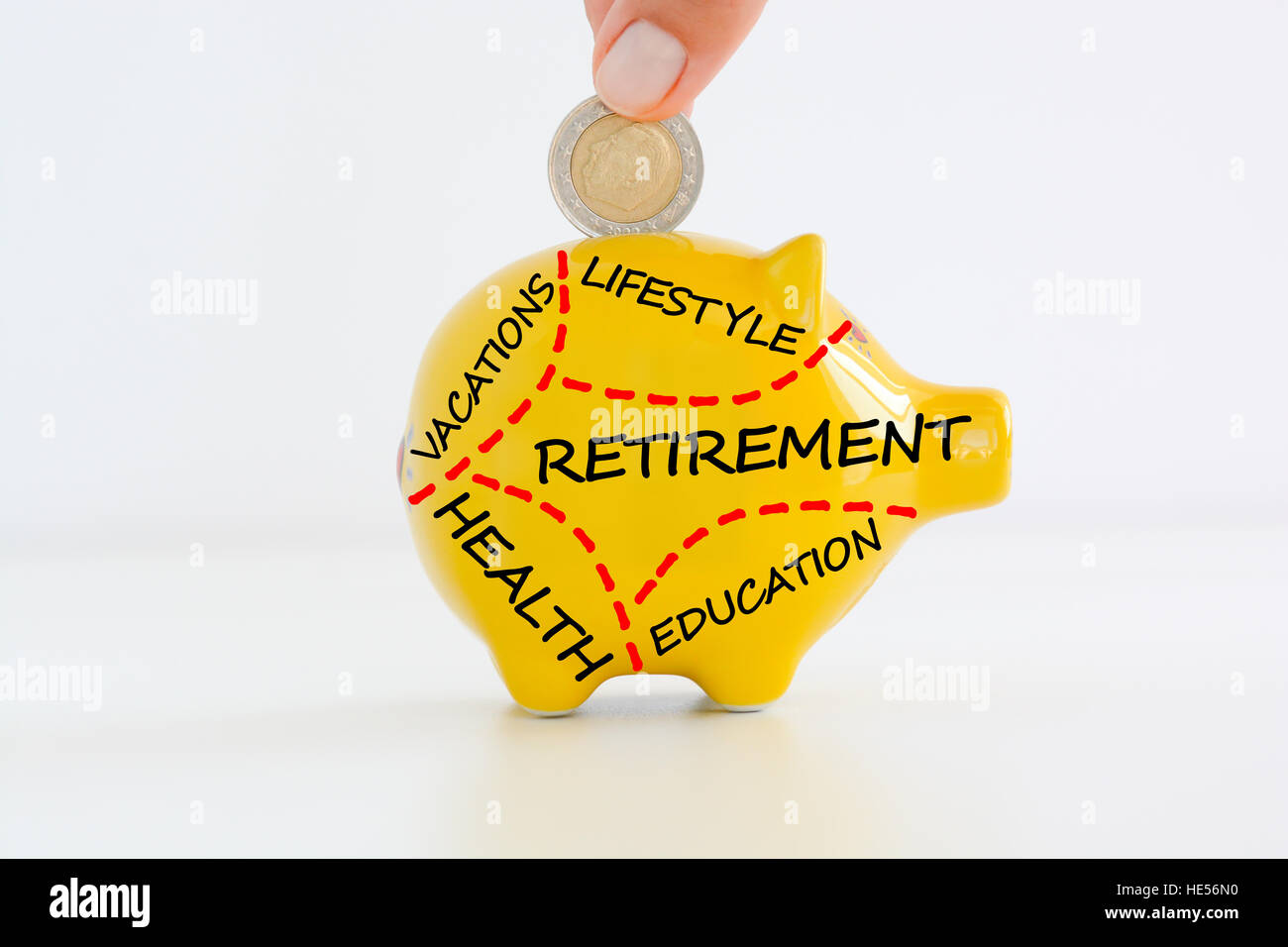 Retirement plan or savings concept with yellow piggy bank Stock Photo