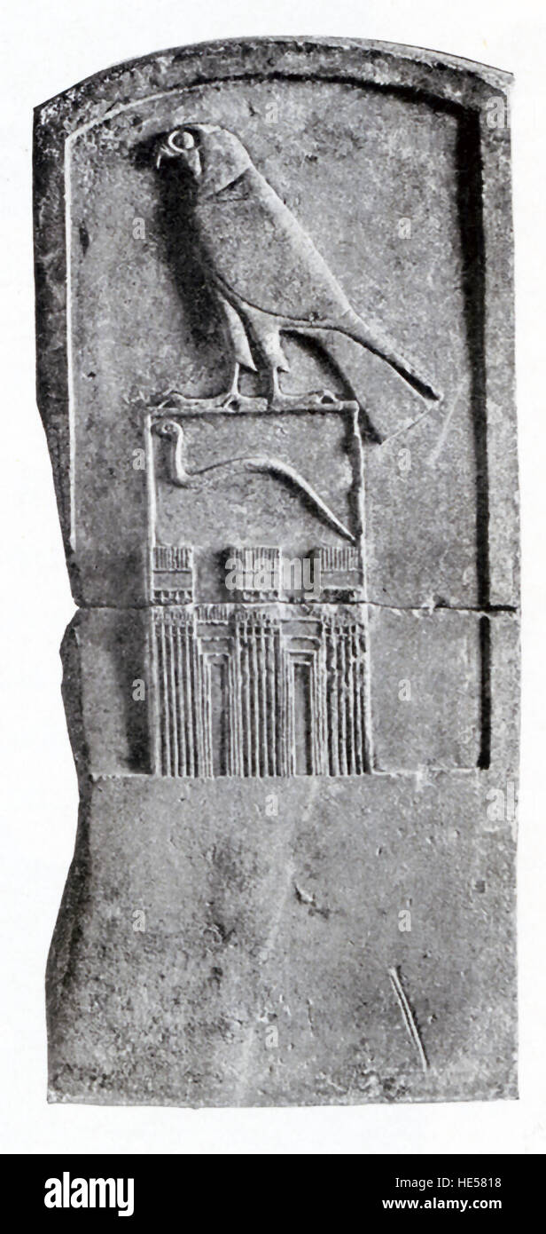 This tomb stele with the king's serpent is from Abydos in Egypt. It is known as the Stele of the Serpent King (one of the king's royal names). It owes its name to the cobra engraved at its center, and to Emile Amelineau, who discovered it in 1896. This is one of the oldest examples of monumental hieroglyphs from the earliest Egyptian dynasties (beginning in 3100 B.C.). This royal stele is outstanding both for its size and its craftsmanship. It is not only a historical document of prime importance, but also a precious example of artistic and linguistic conventions dating back to 3100 B.C. Stock Photo