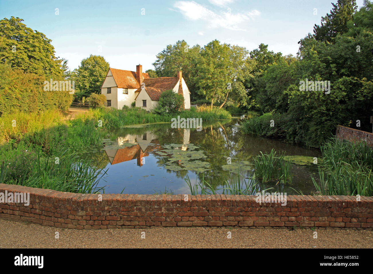 Willy Lott's house / cottage on the river Stour at Flatford mill East Bergholt Suffolk as seen in John Constable's Haywain Stock Photo