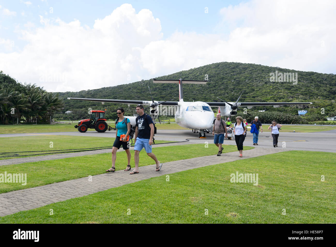 Tourists arriving at Lord Howe Island on a QantasLink de Havilland aircraft, New South Wales, NSW, Australia Stock Photo