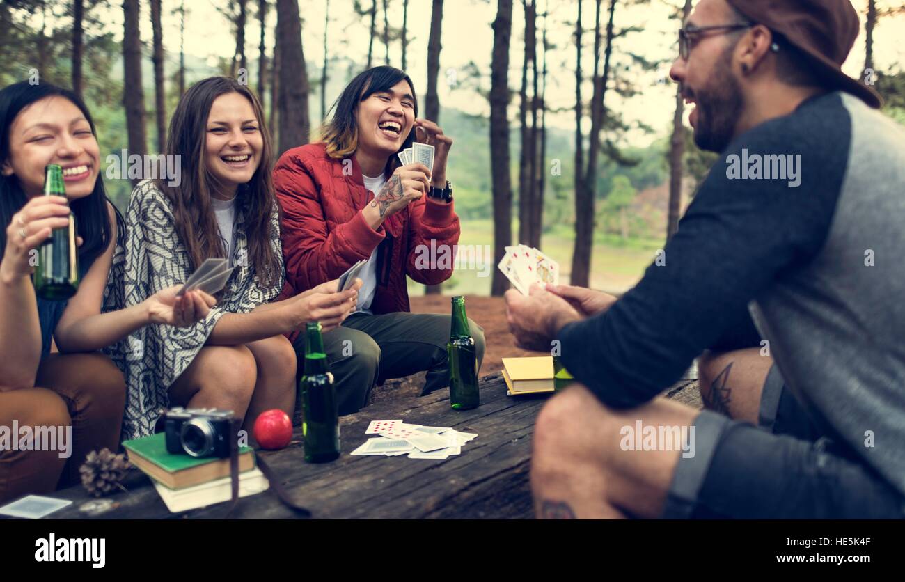 Friends Camping Playing Cards Concept Stock Photo