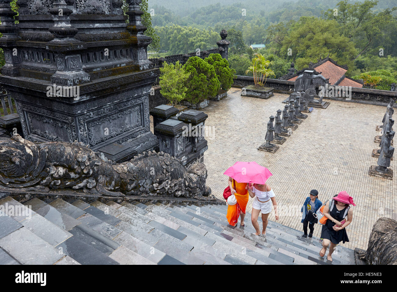 Tourists ascend from the Salutation Court to the Thien Dinh Palace. Tomb of Khai Dinh (Ung Tomb), Hue, Vietnam. Stock Photo