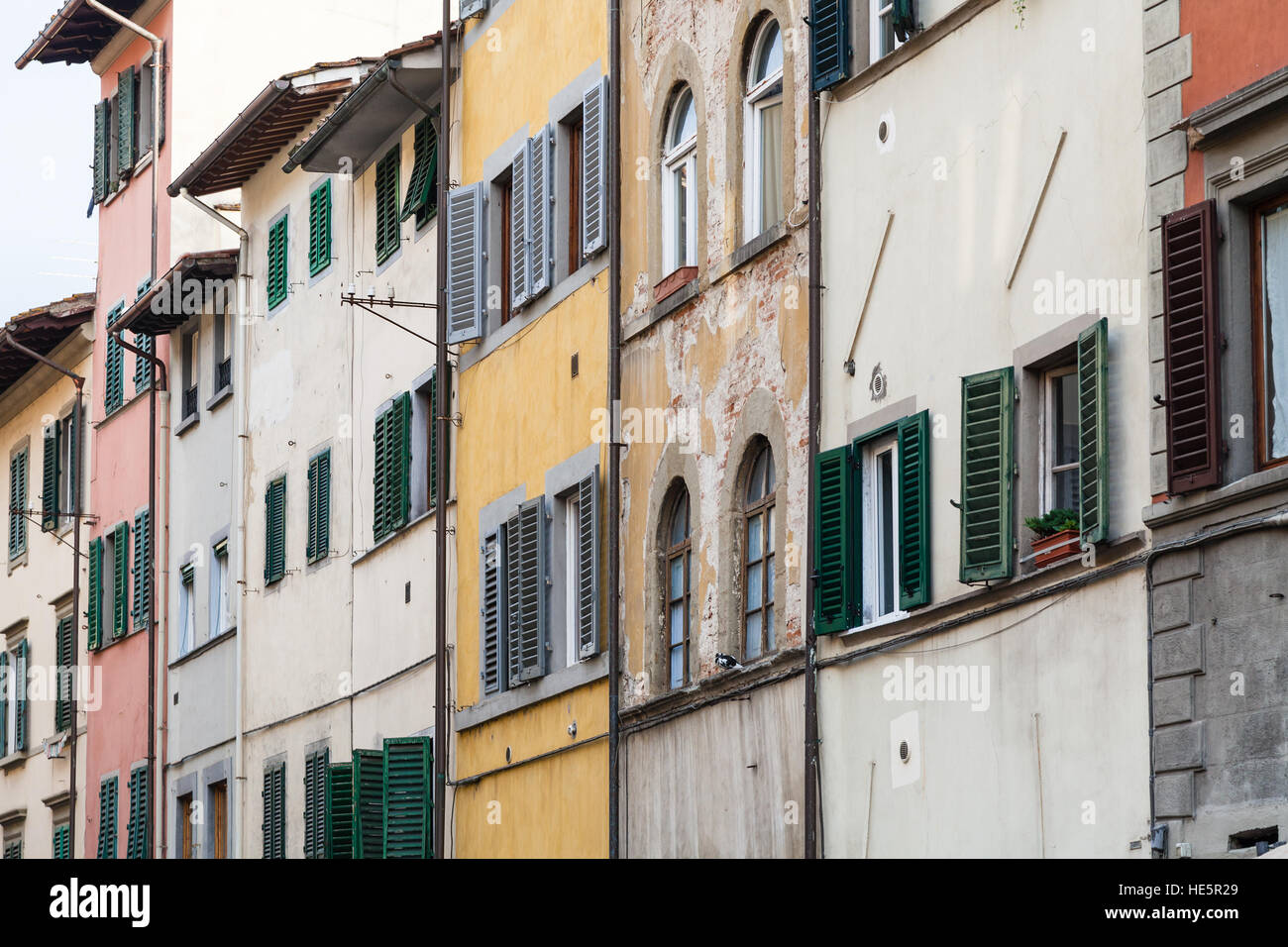 travel to Italy - facades of old shabby houses in Florence city Stock ...