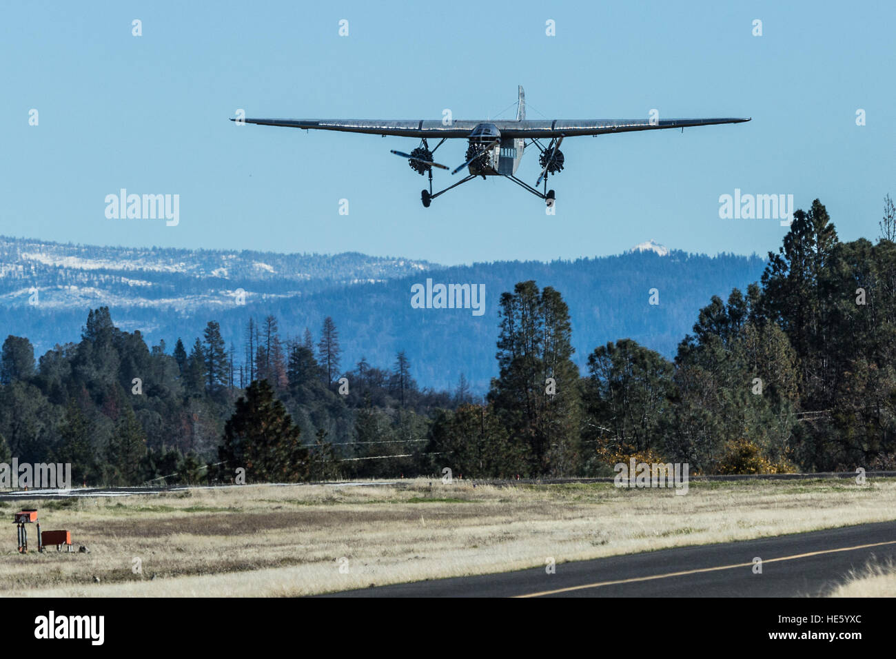 Groveland, California, USA. 17th Dec, 2016. Saturday, December 17, 2016.A 1928 Ford Tri-Motor airplane lands at the Pine Mountain Lake Airport in Groveland, California. This Ford Tri-Motor NC9645, nicknamed The Tin Goose, has a wingspan of 77 feet 6 inches and was constructed in 1928. It was named the City of Wichita, and it was used to introduce the first coast-to-coast passenger air/rail service in the United States on July 7, 1929, and the development and inauguration of the first all air passenger service on October 25, 1930. The plane can carry up to 10 passengers.Experimental Ai Stock Photo