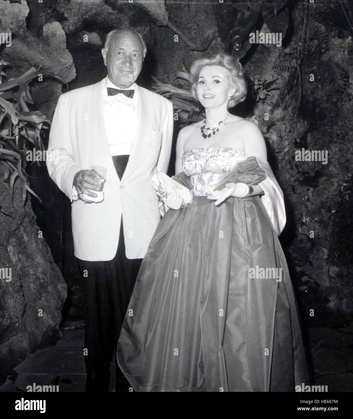 ZSA ZSA GABOR (born Sari Gabor, February 6, 1917 - December 18, 2016) was a Hungarian-American actress and socialite. Miss Hungary in 1936 emigrated to the United States in 1941, and became a sought-after actress. Outside of her acting career, Gabor was best known for her extravagant Hollywood lifestyle, glamorous personality, and her many marriages. She had nine husbands, including hotel magnate Conrad Hilton and actor George Sanders. PICTURED: ZSA ZSA GABOR and husband CONRAD HILTON in the 1940's. © Globe Photos/ZUMAPRESS.com/Alamy Live News Stock Photo