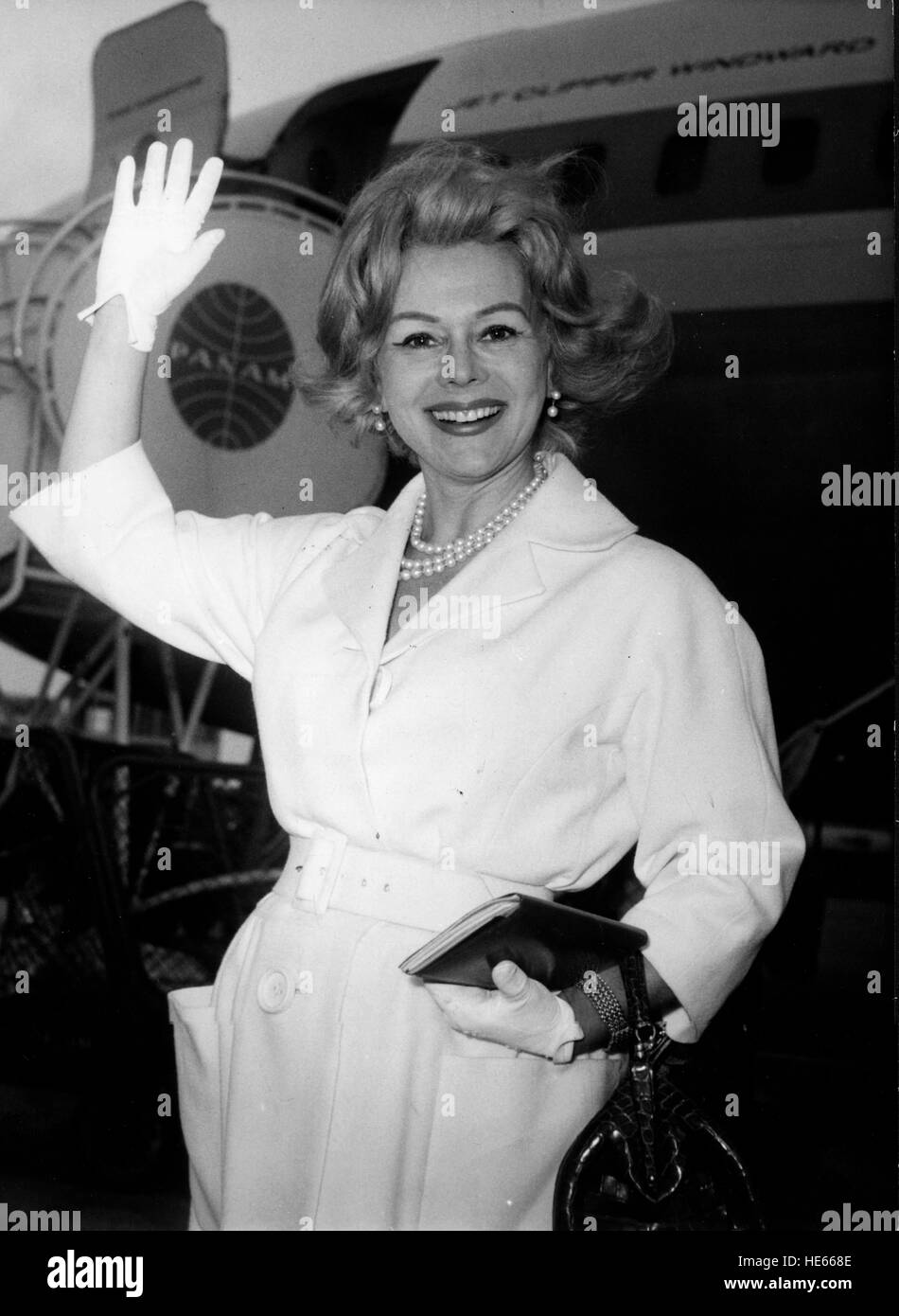 Actress Zsa Zsa Gabor waves when arriving at airport Stock Photo - Alamy
